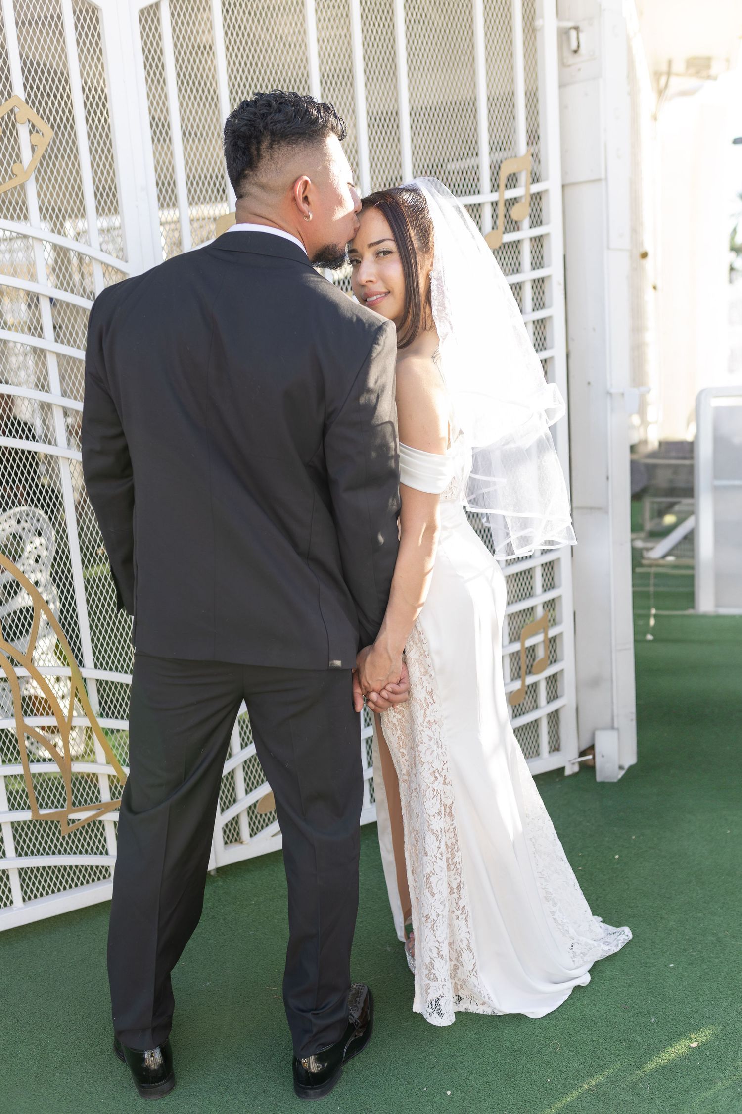 Bride and groom exchanging vows at the Little White chapel in downtown Las Vegas- intimate wedding and elopement photographer