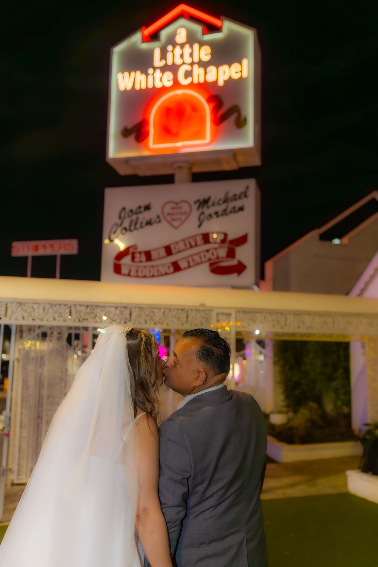 Bride and groom exchanging vows at the Little White chapel in downtown Las Vegas- intimate wedding and elopement photographer