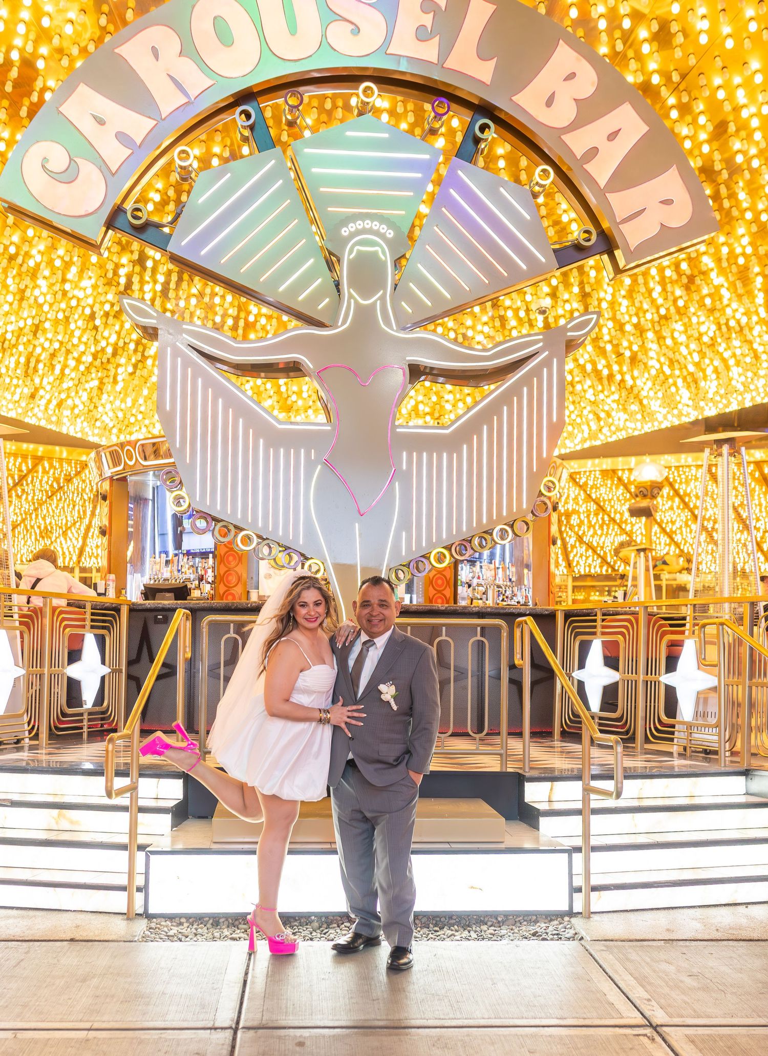 Couples eloping under neon lights on Fremont Street-Las Vegas photographer