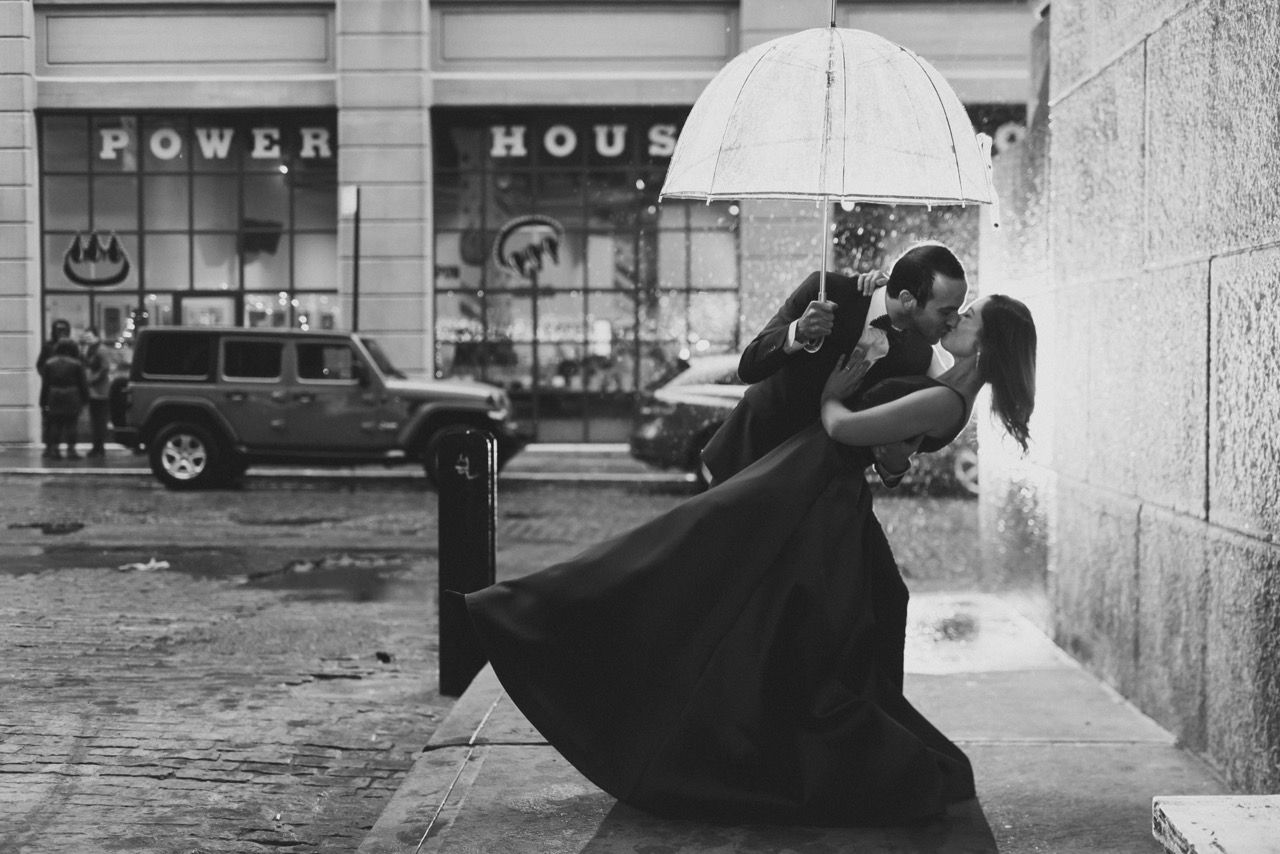 Black and white romantic dance pose in front of the Power House building.