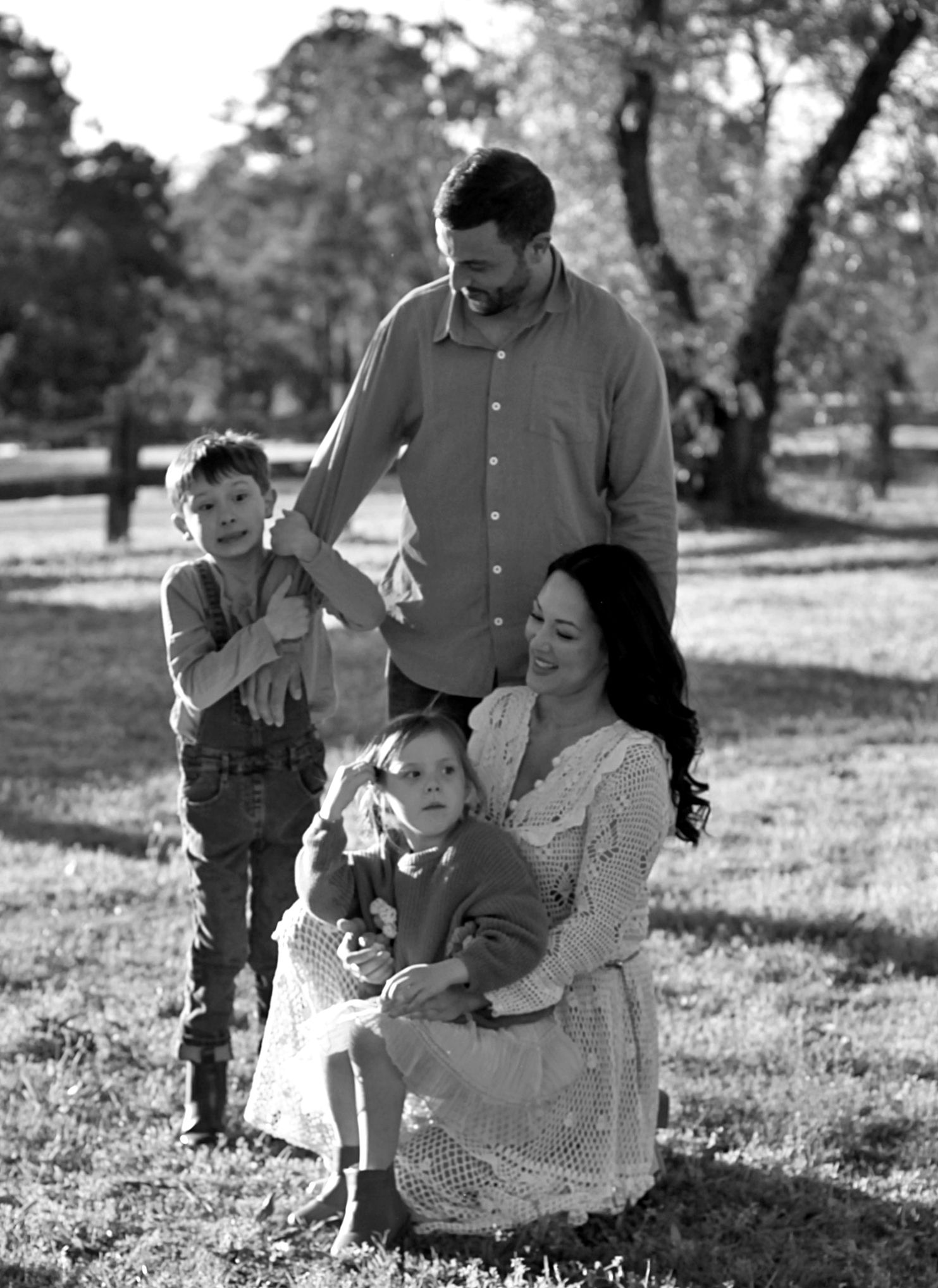 Candid portrait during a family session of family together in the countryside