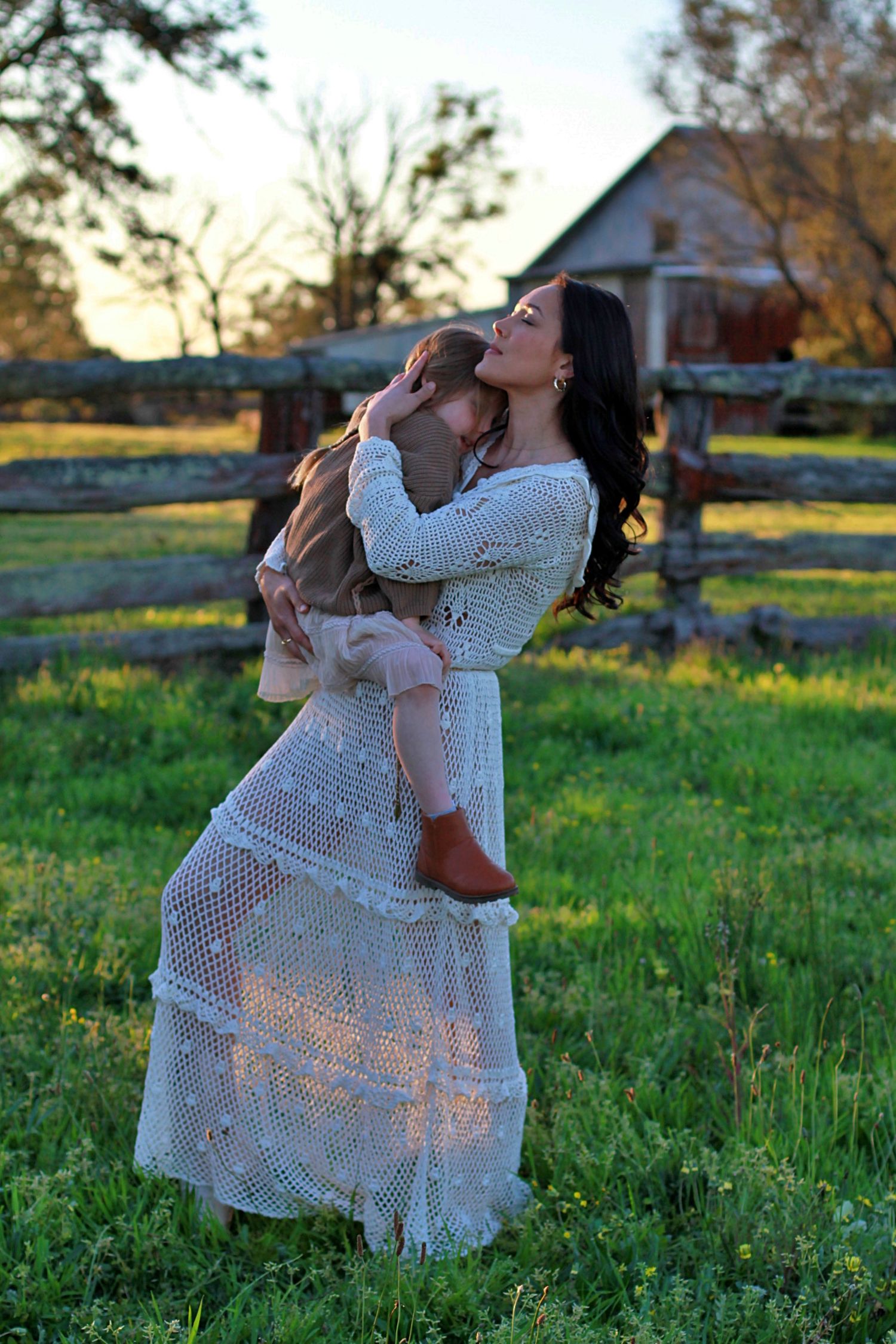 Daughter and mum sharing an intimate moment during a family session