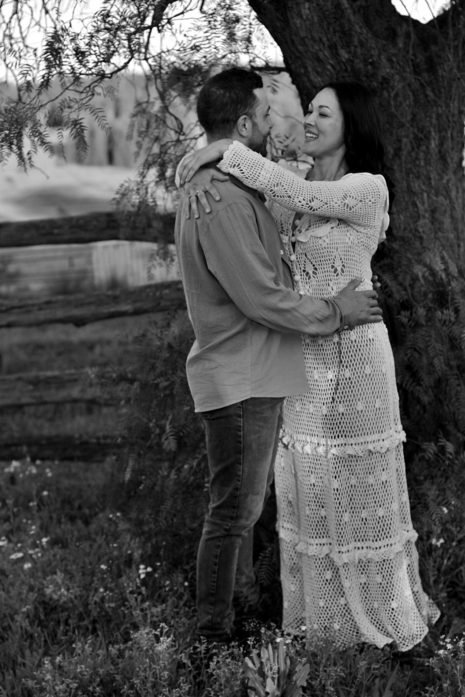 Romantic couple embracing and sharing a quiet connection during a family session