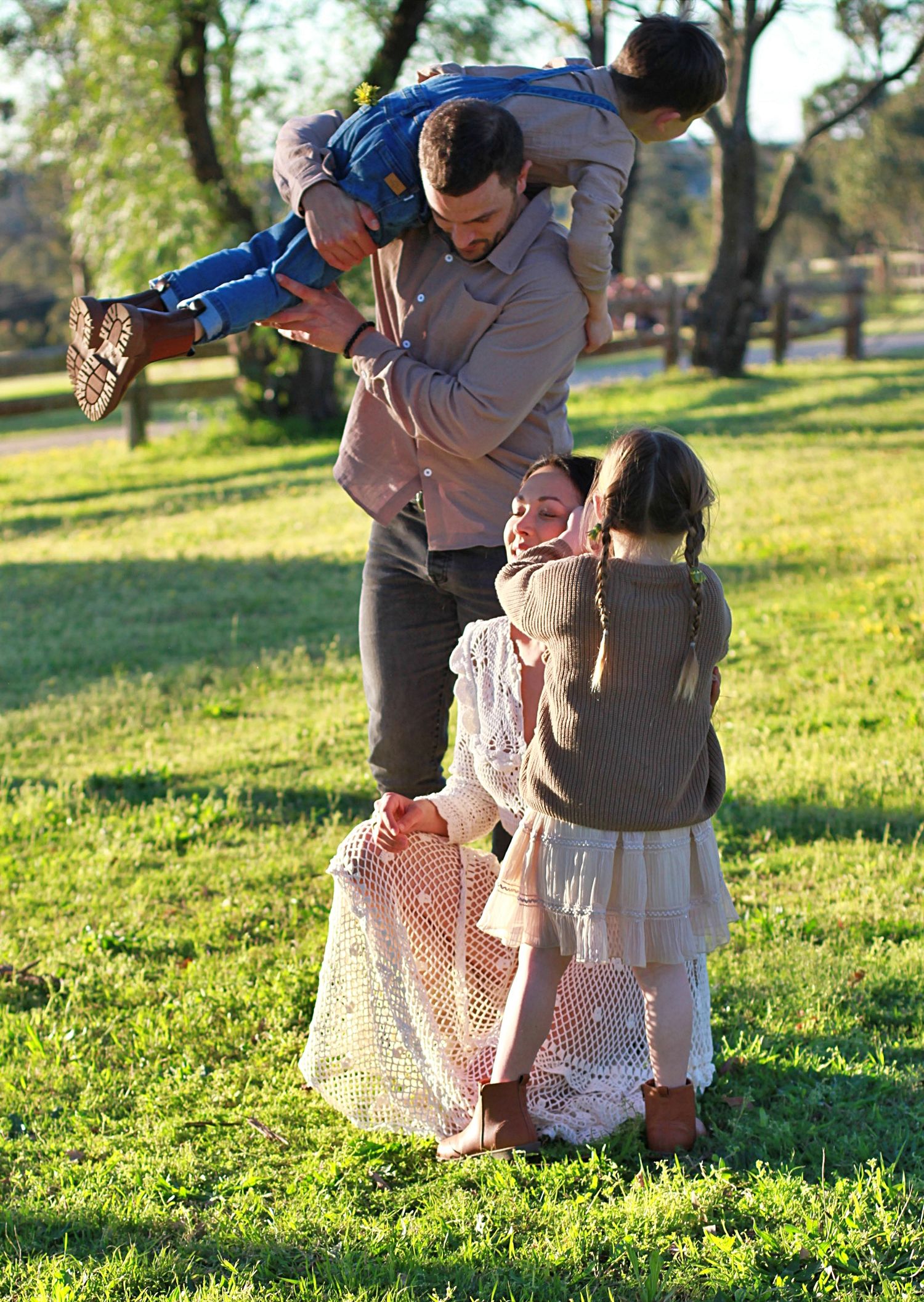 Candid portrait during a family session of family together in the countryside