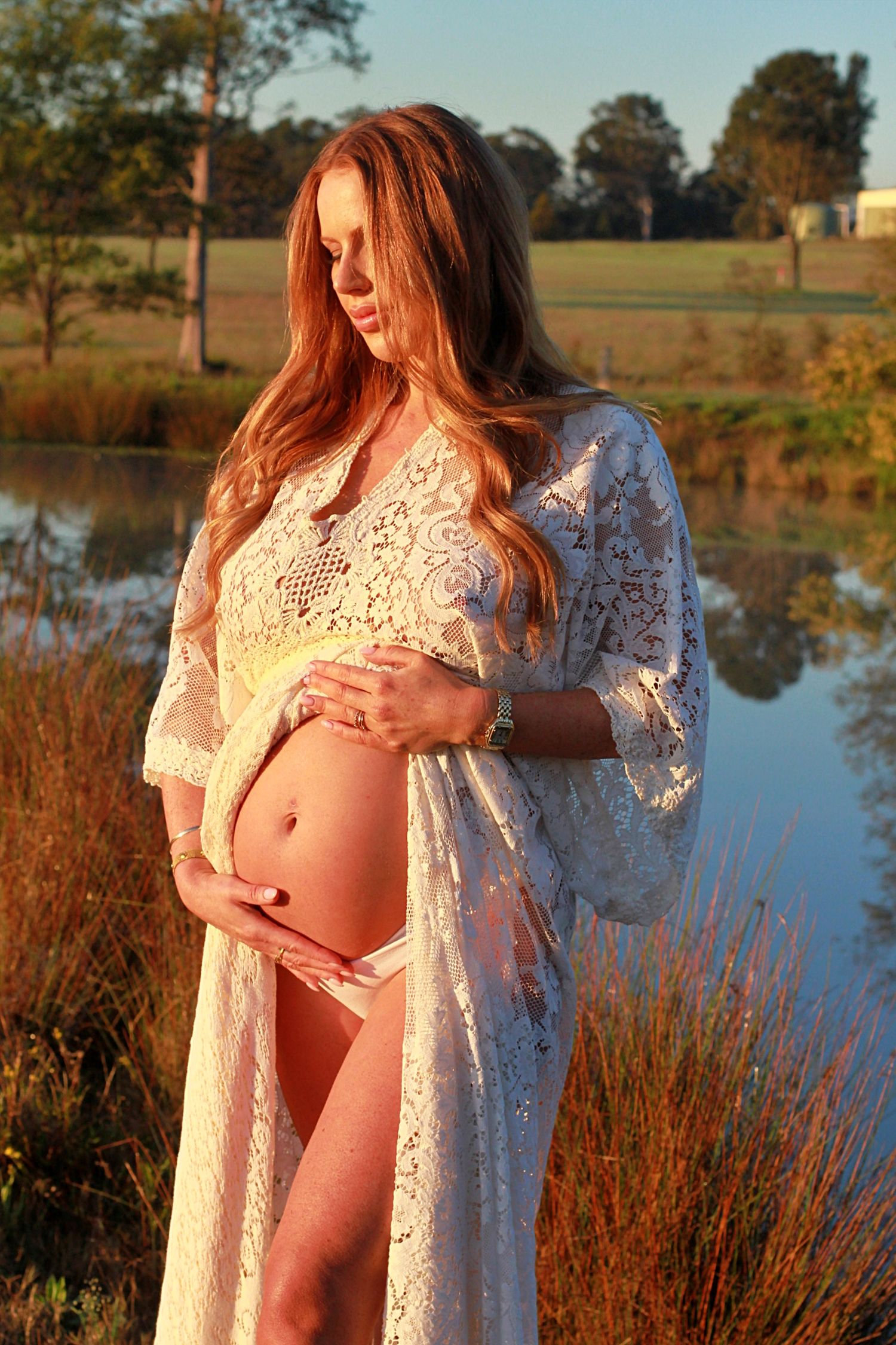 Natural light maternity portraits captured at sunrise by A Lasting Impression Photography.