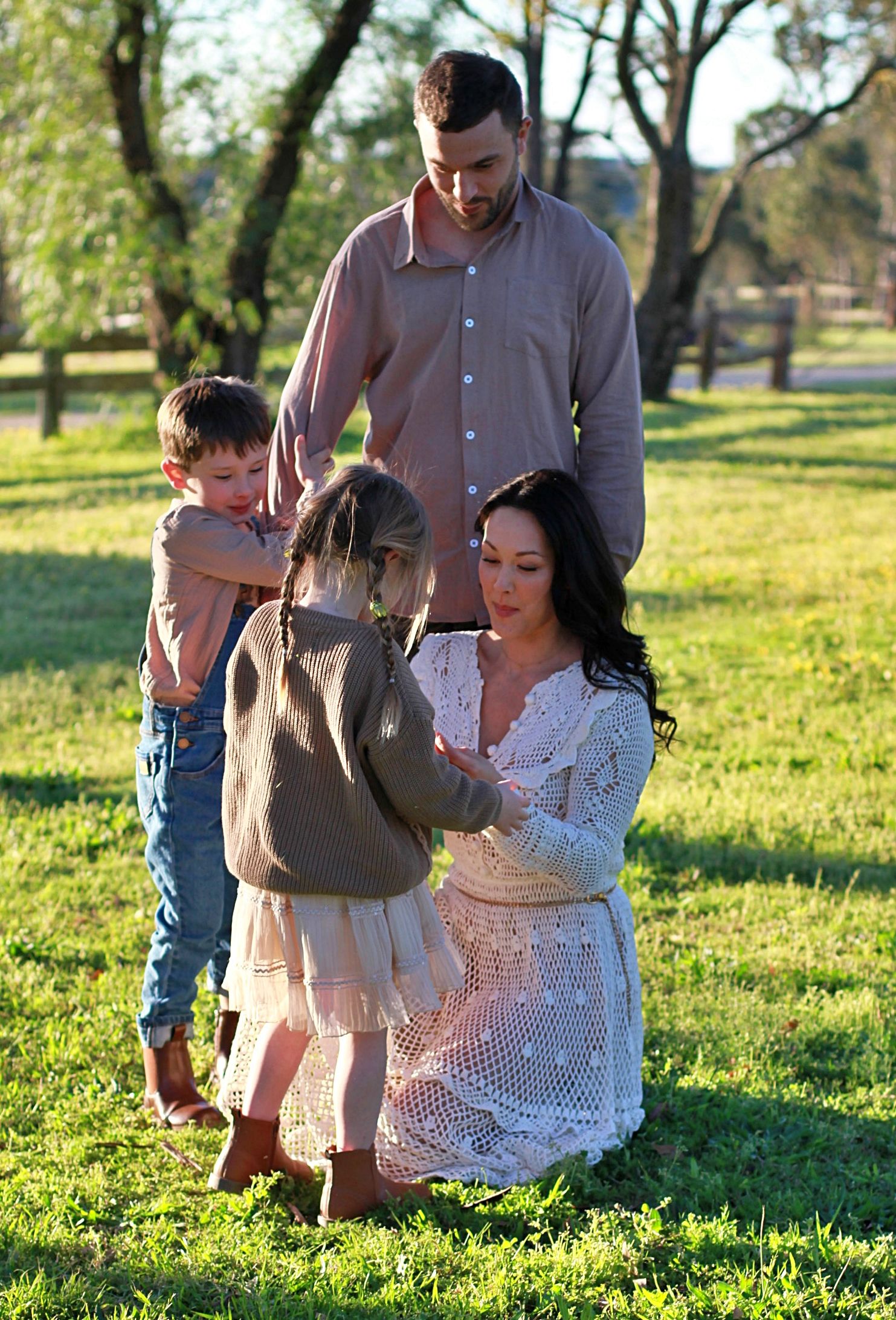 Candid portrait during a family session of family together in the countryside