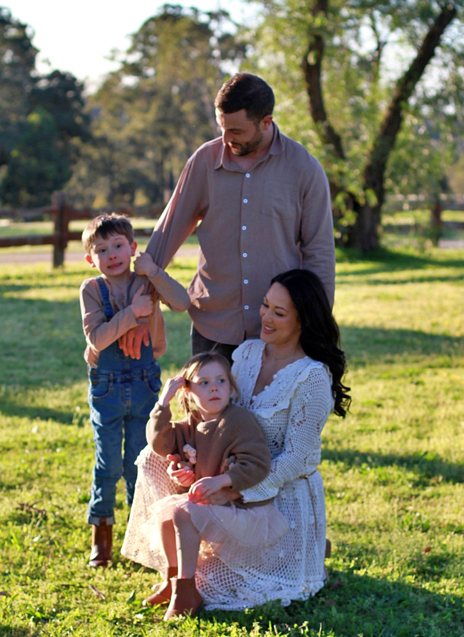 Candid portrait during a family session of family together in the countryside