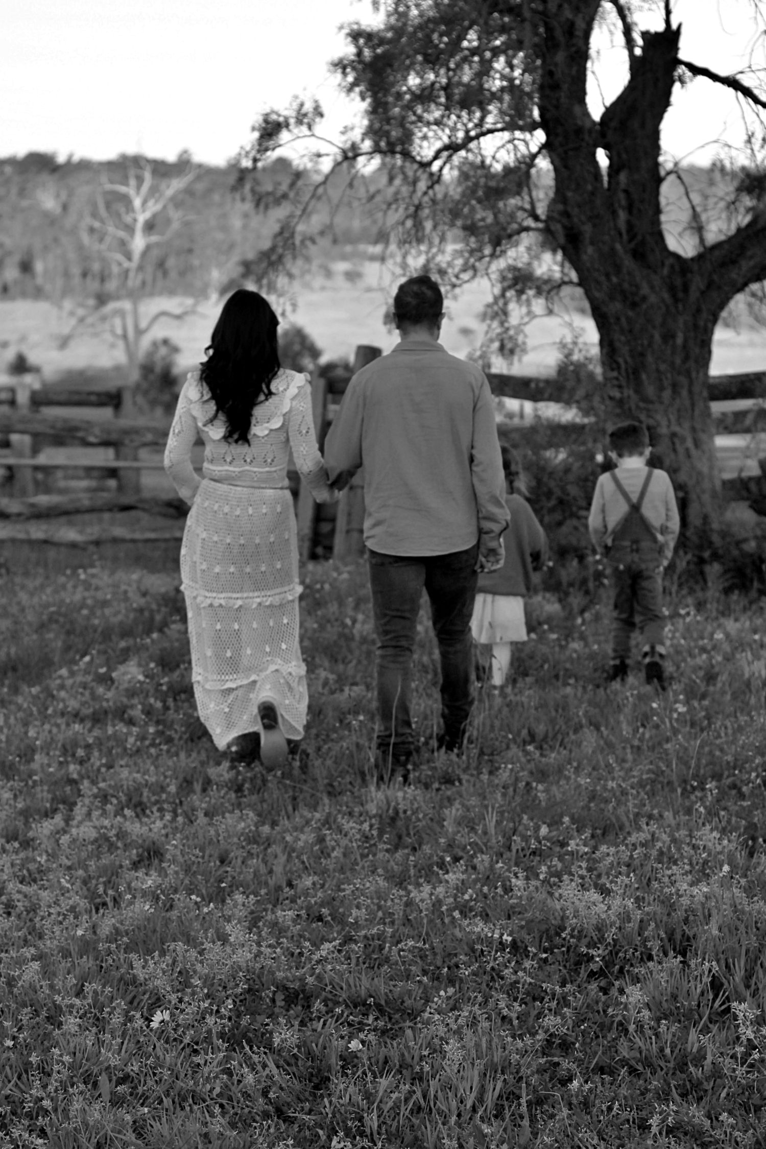 Candid portrait during a family session of family together in the countryside