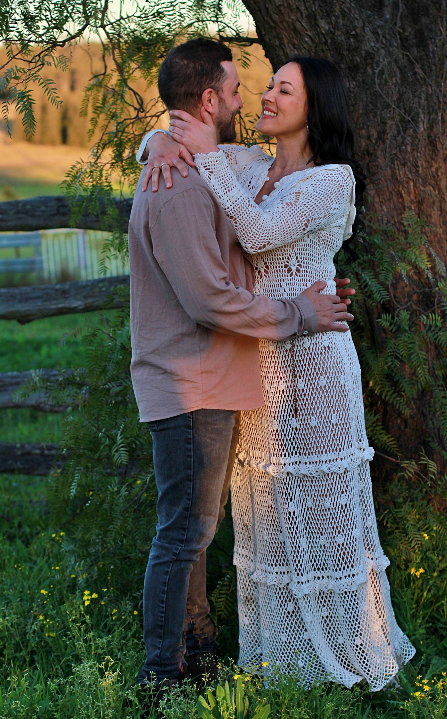 Romantic couple embracing and sharing a quiet connection during a family session