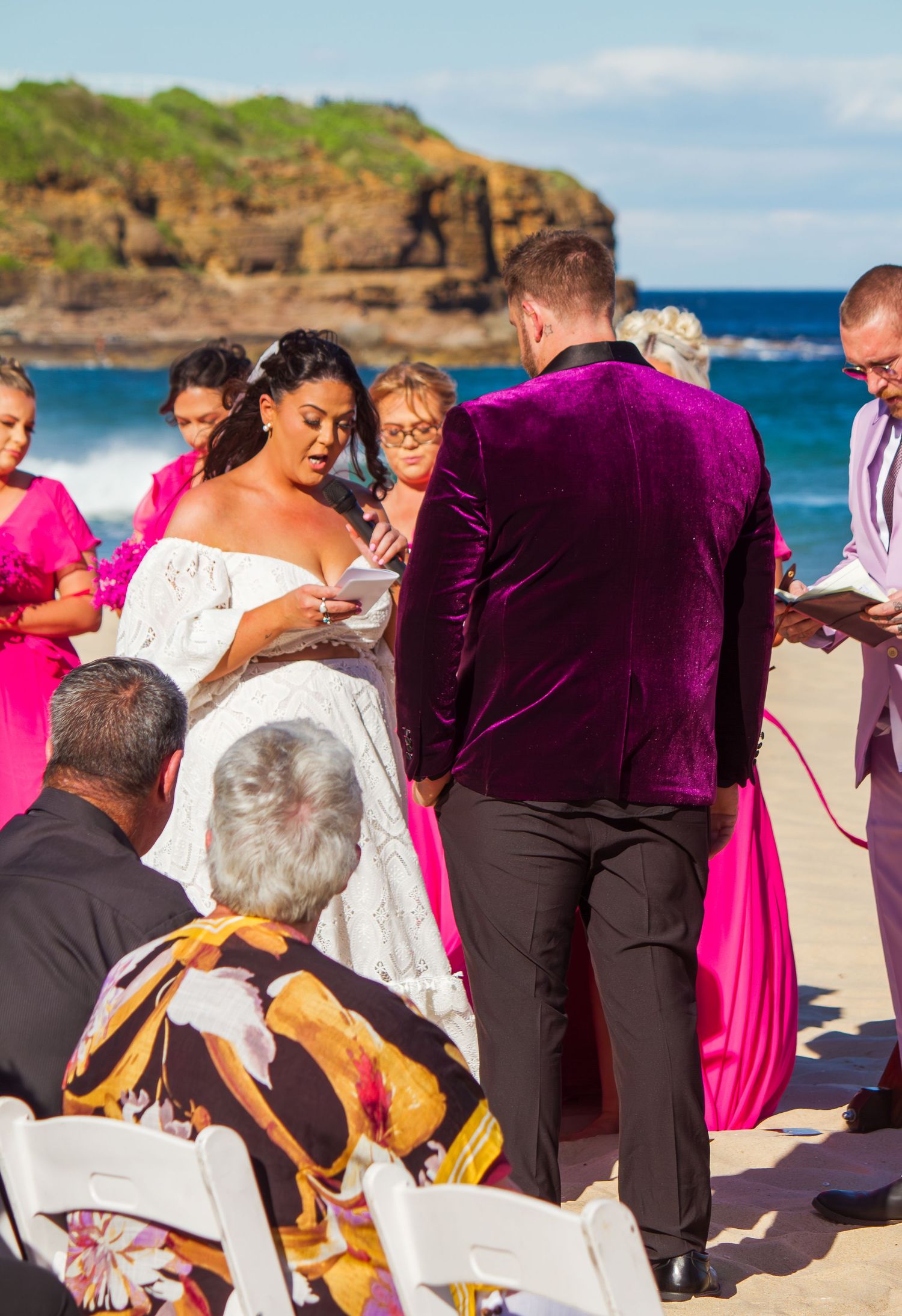 Bride reading her wedding vows during an intimate Illawarra beach ceremony