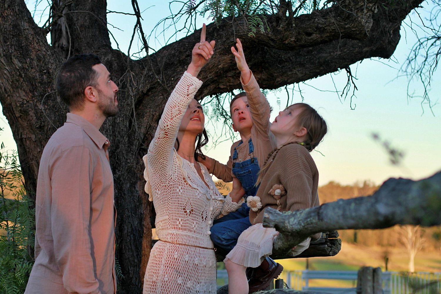 Candid portrait during a family session of family together in the countryside