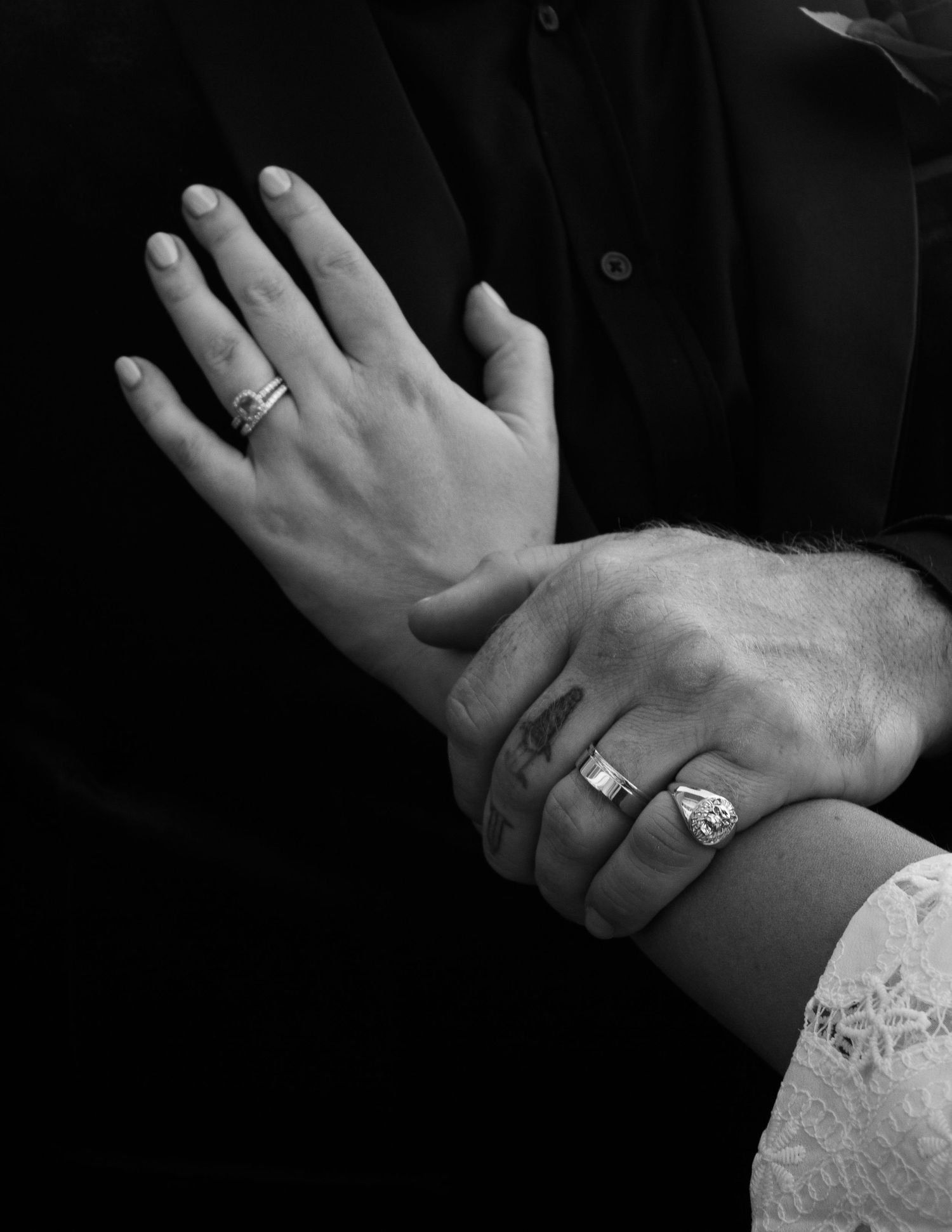 Close up wedding ring photo showing the couple’s rings in elegant detail.