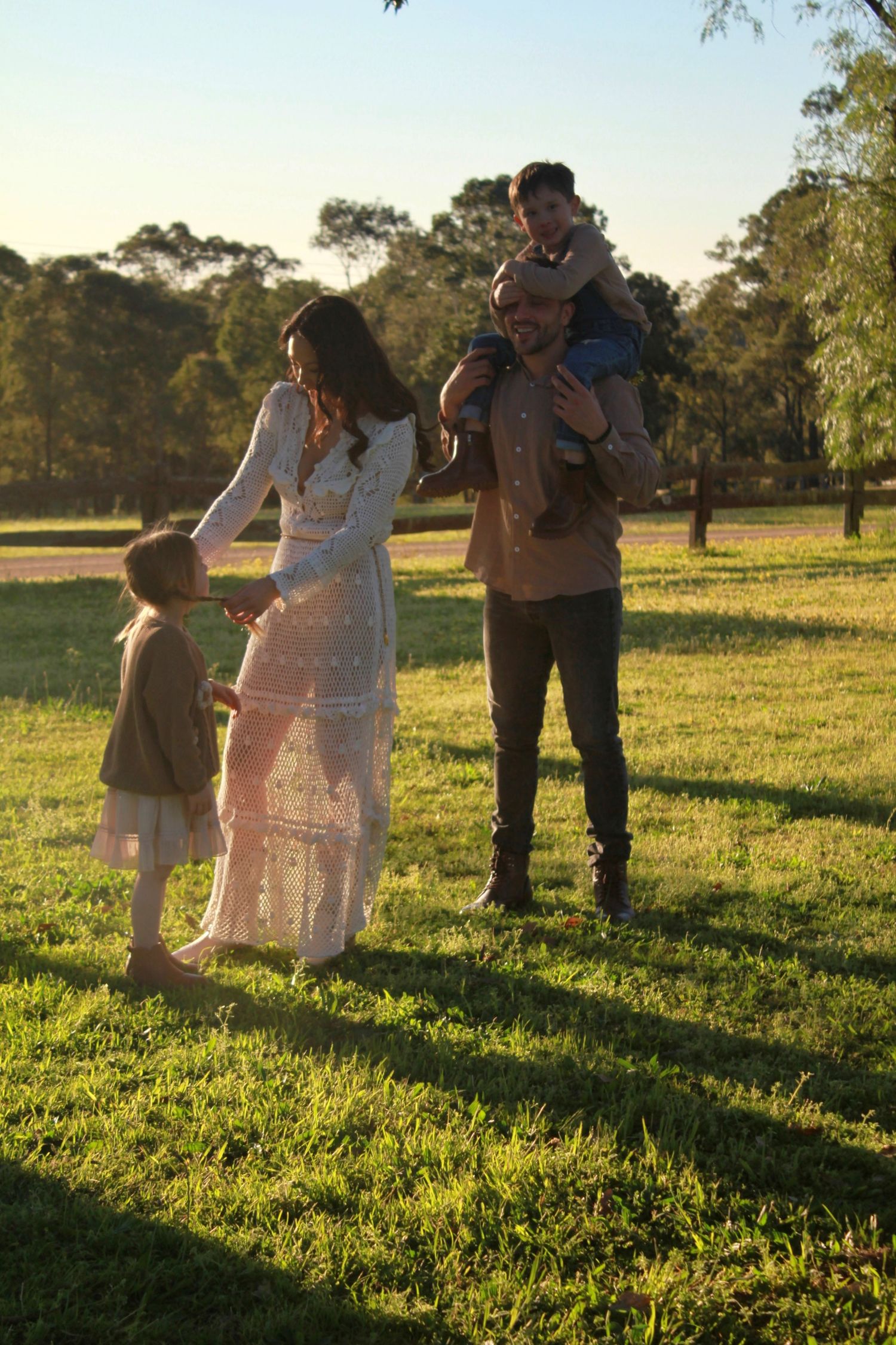 Candid portrait during a family session of family together in the countryside