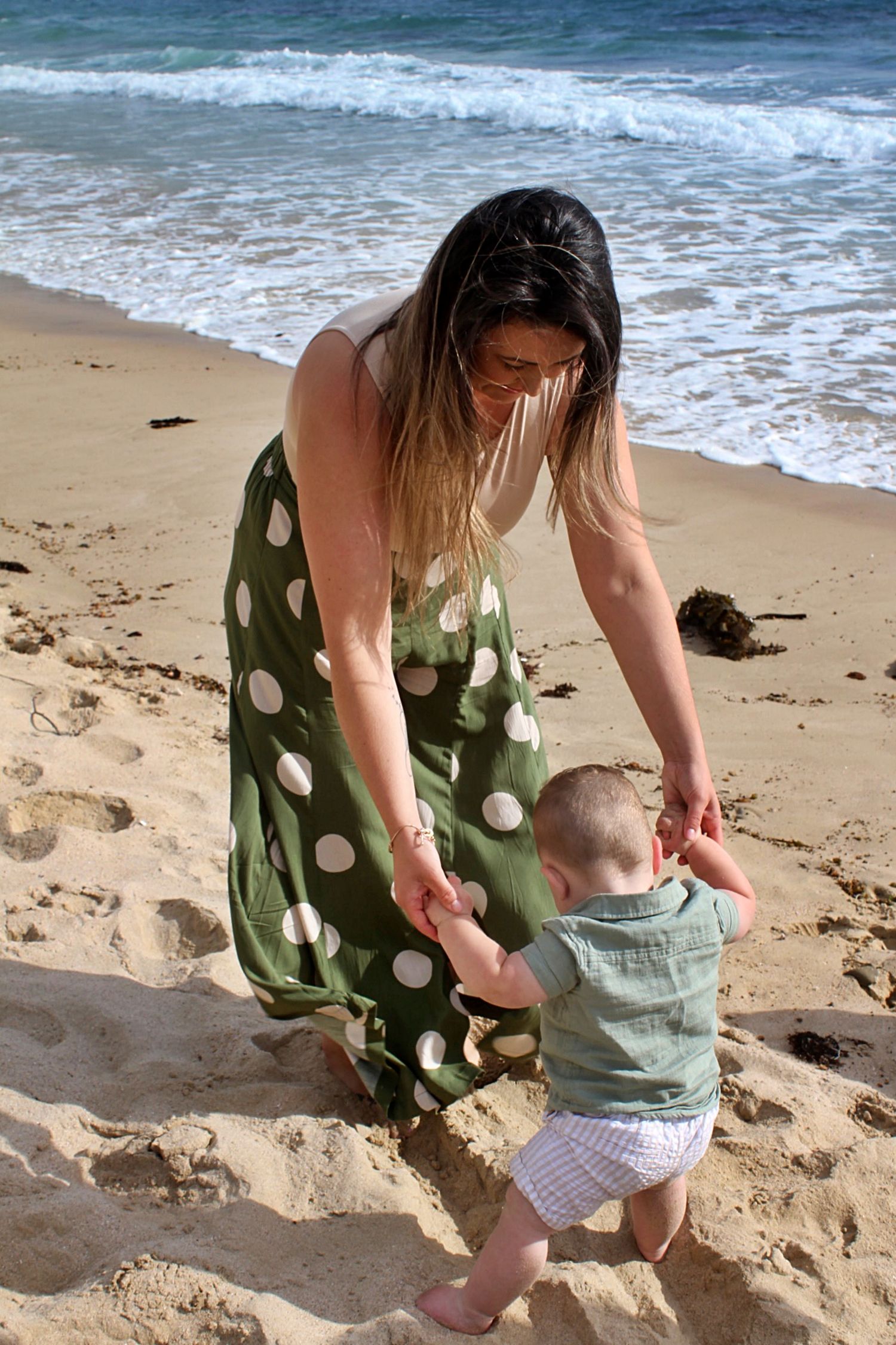 Candid mum and son portraits on the beach in the Illawarra, capturing tenderness and natural family connection
