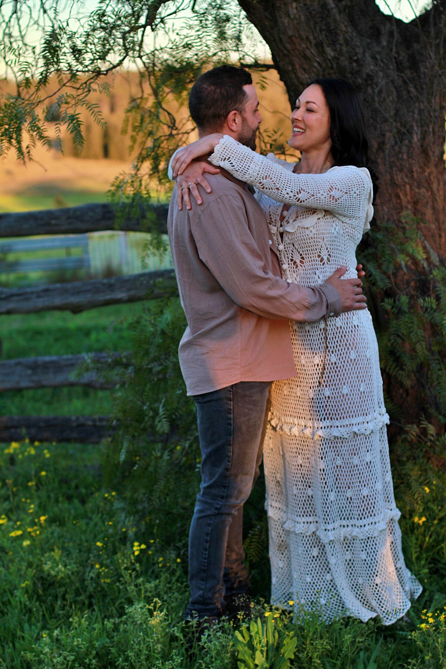 Romantic couple embracing and sharing a quiet connection during a family session