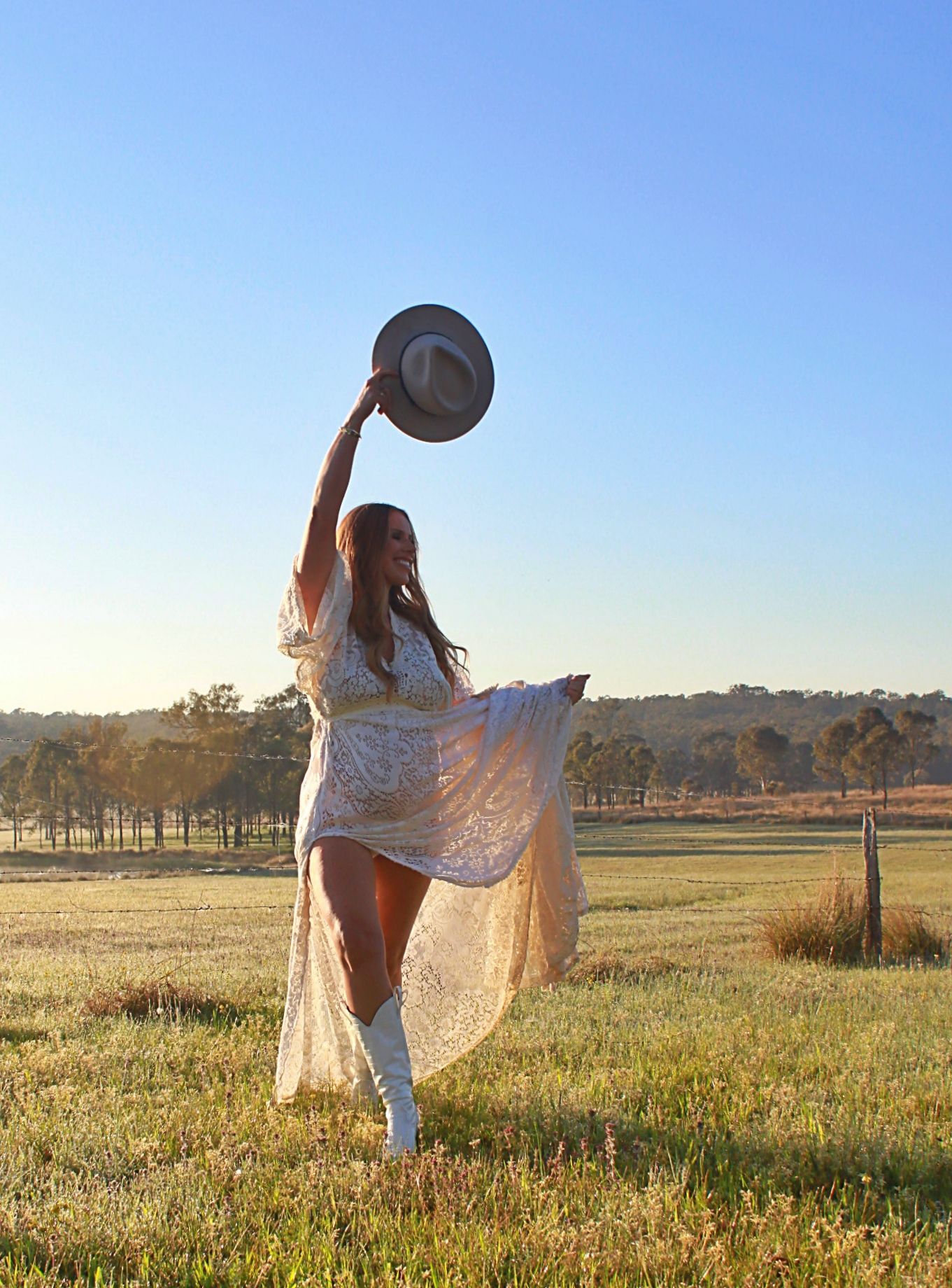 Serene maternity photos captured at sunrise outdoors by A Lasting Impression Photgraphy.