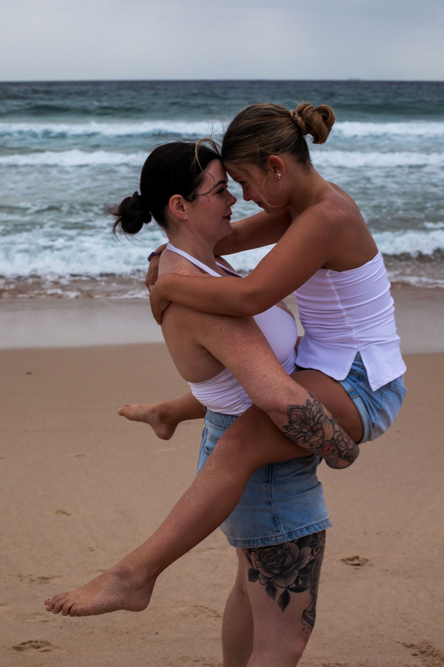 Loving portrait, mother & daughter sharing a gentle moment during a motherhood session taken by A Lasting Impression Photography.