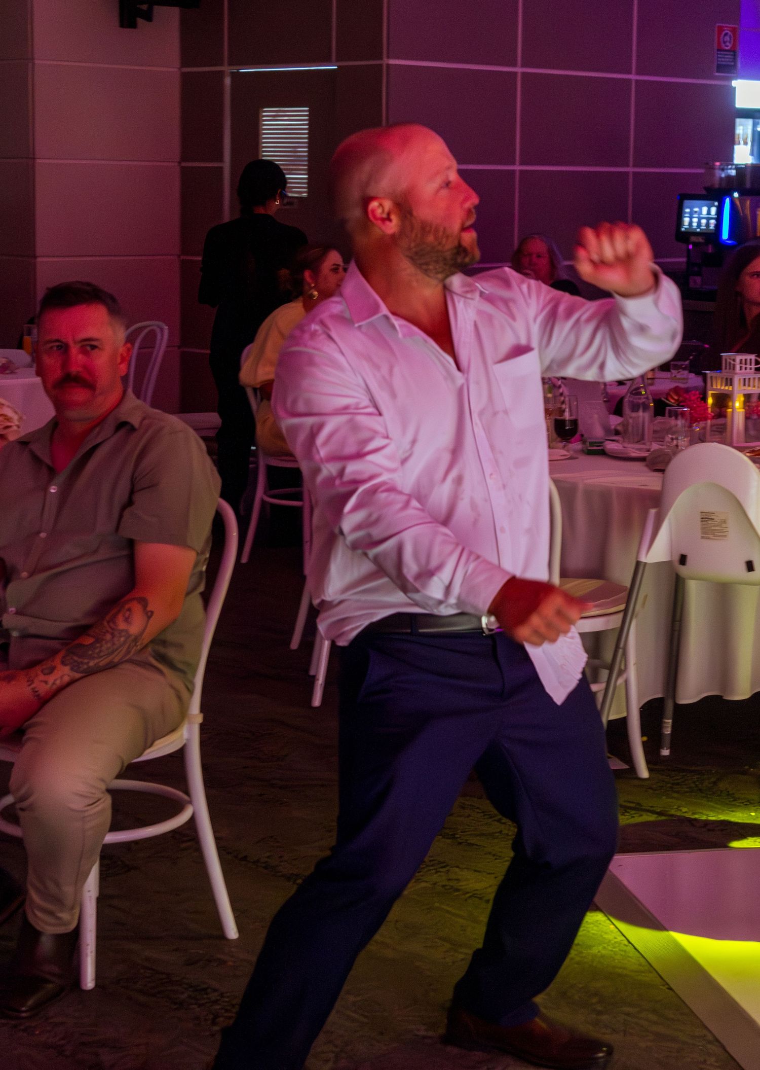 Guests celebrating on the dance floor at the wedding reception, fun party moments with friends and family taken in the Illawarra.