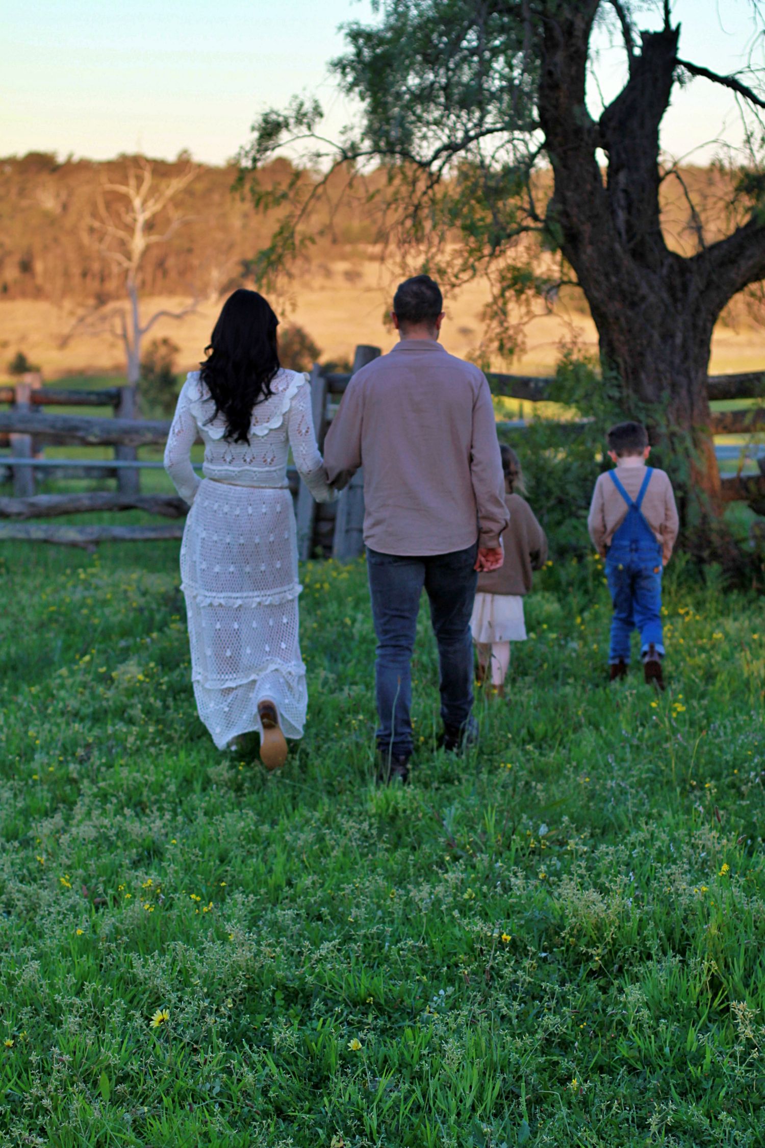 Candid portrait during a family session of family together in the countryside