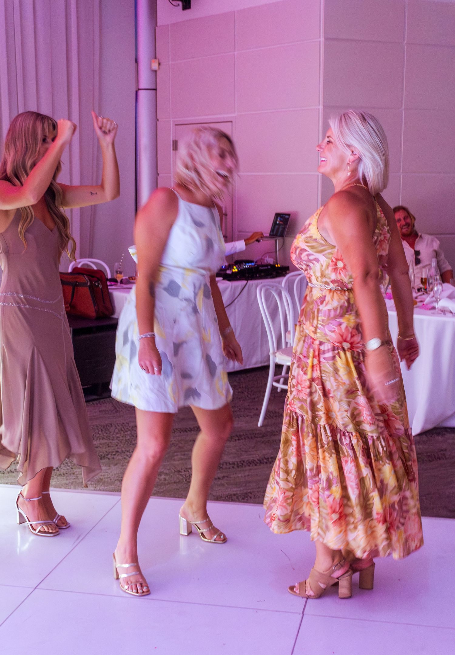 Guests celebrating on the dance floor at the wedding reception, fun party moments with friends and family taken in the Illawarra.
