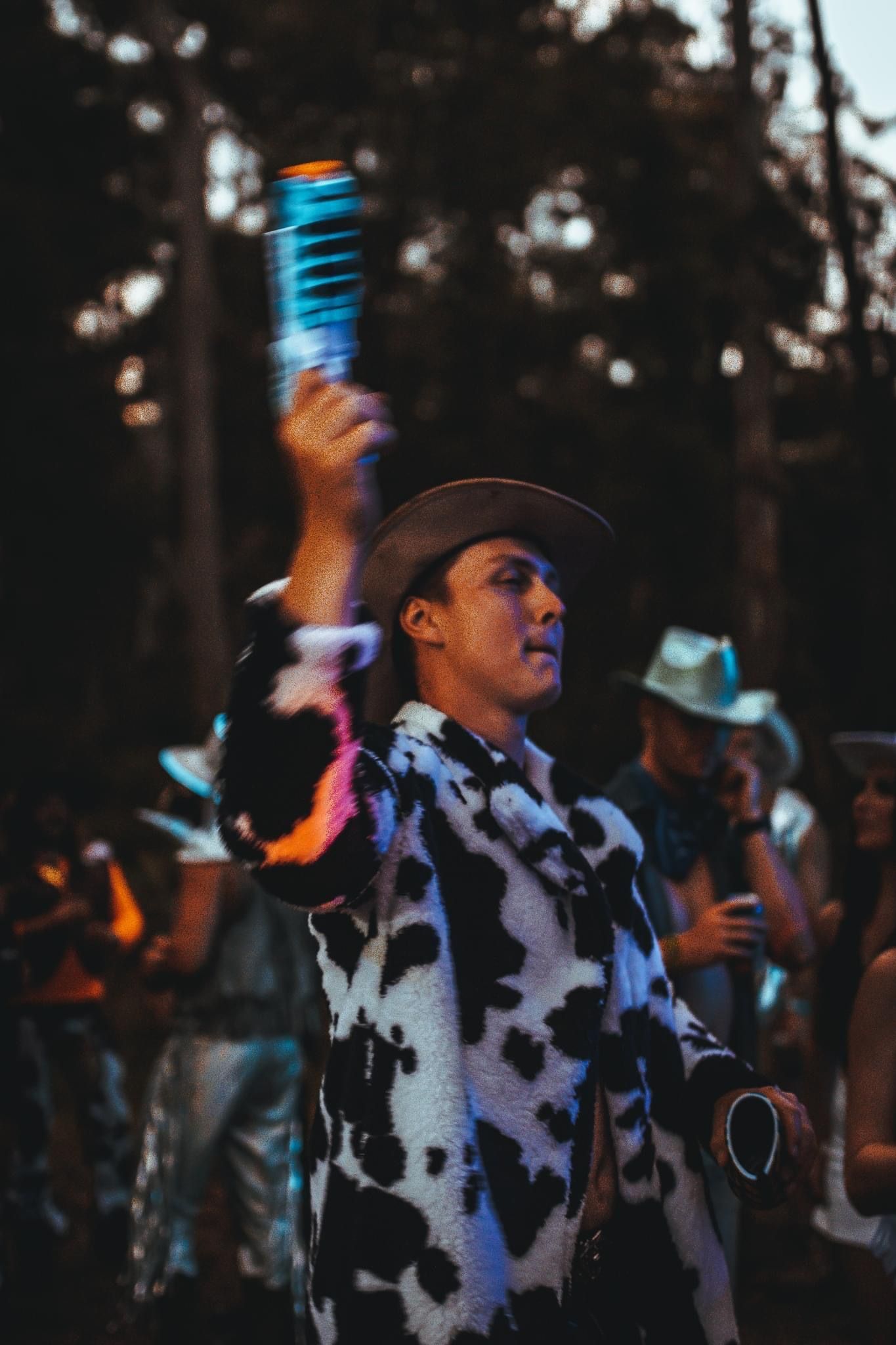 water pistol festival cow print coat