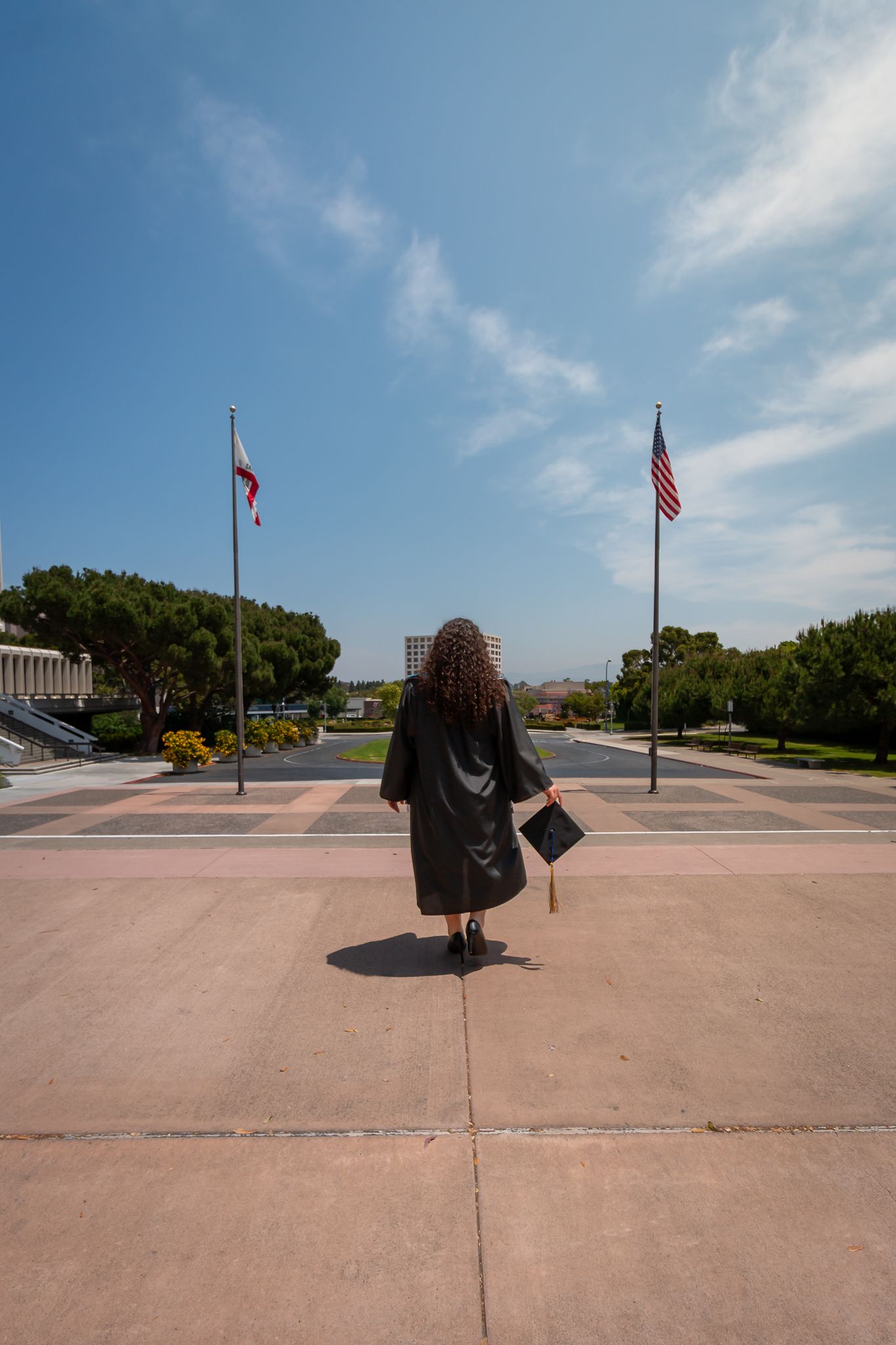 A sequence of photos showing a graduation cap being tossed into the air against a blue sky with flags and trees in background.