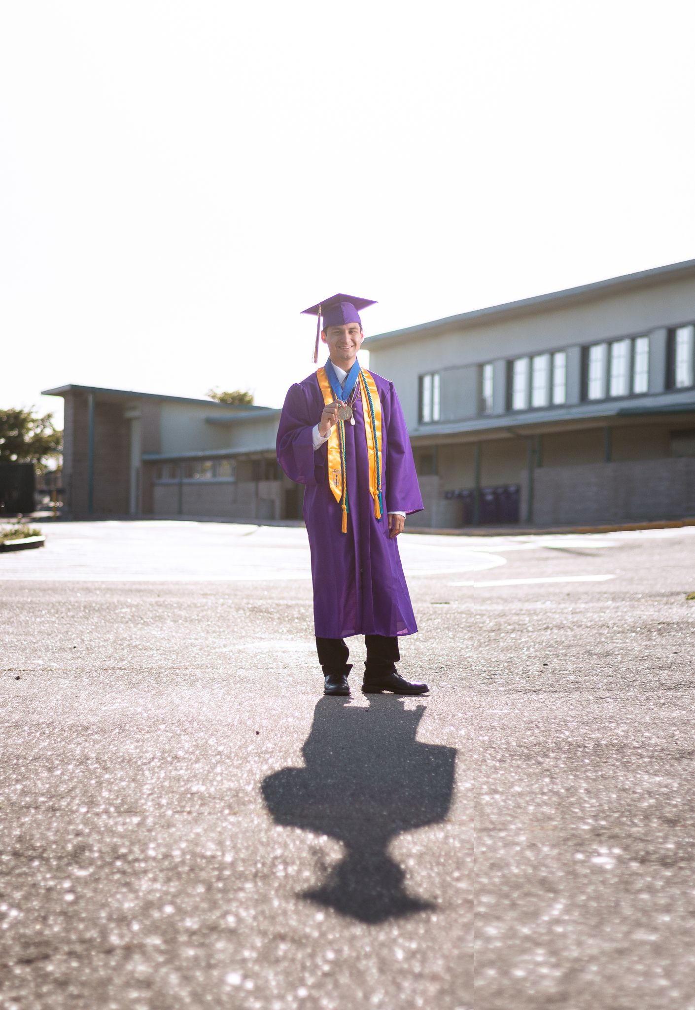 Los Angeles graduation photographer on campus Cap and gown graduation photos Los Angeles High school senior graduation photos outdoors