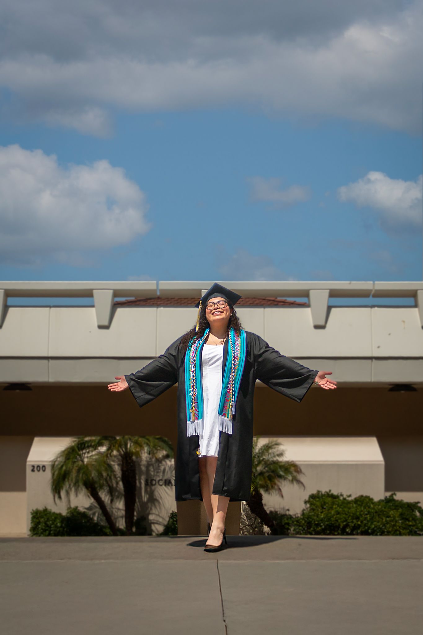 Los Angeles graduation photographer on campus Cap and gown graduation photos Los Angeles High school senior graduation photos outdoors