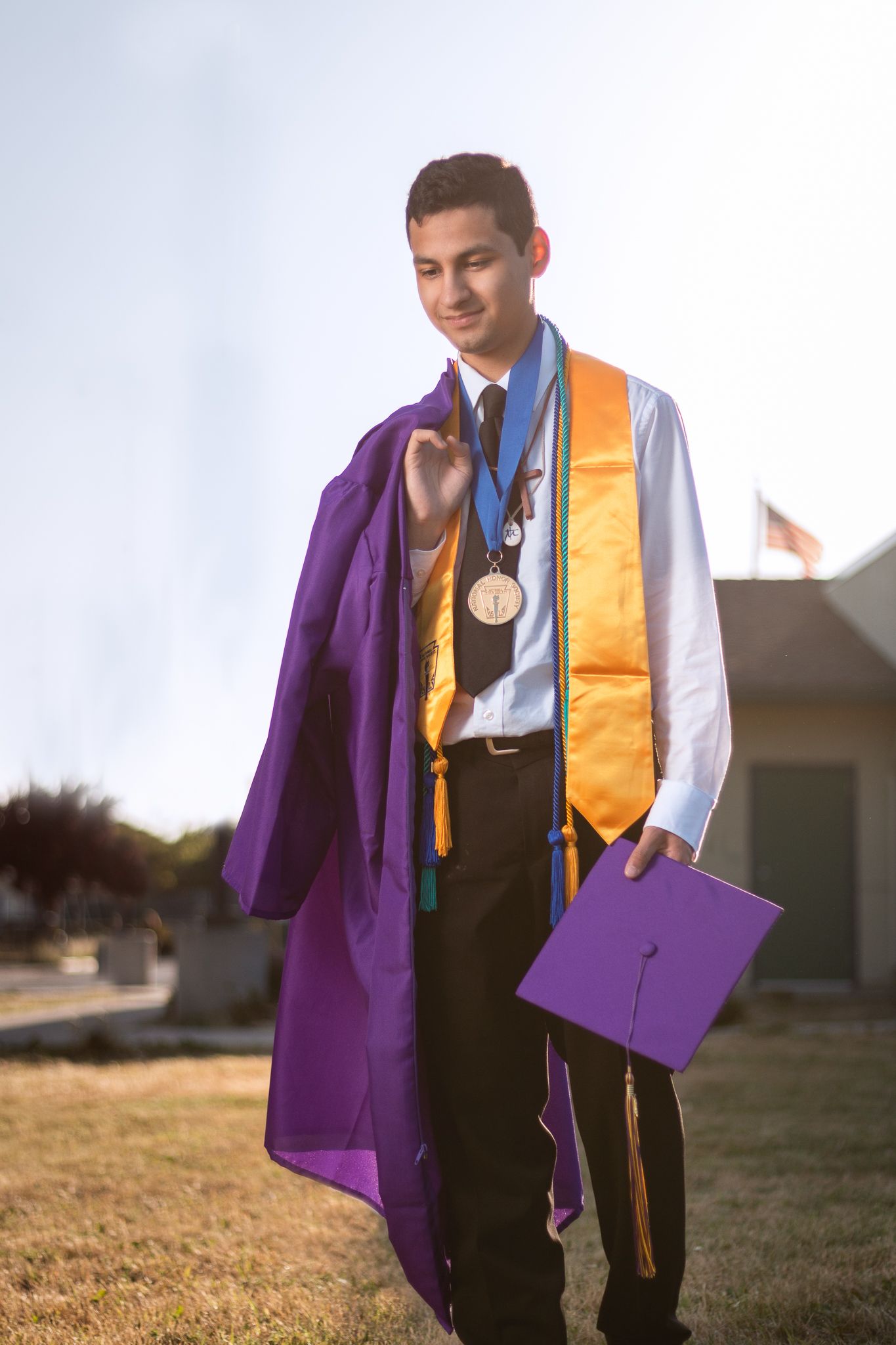 Los Angeles graduation photographer on campus Cap and gown graduation photos Los Angeles High school senior graduation photos outdoors