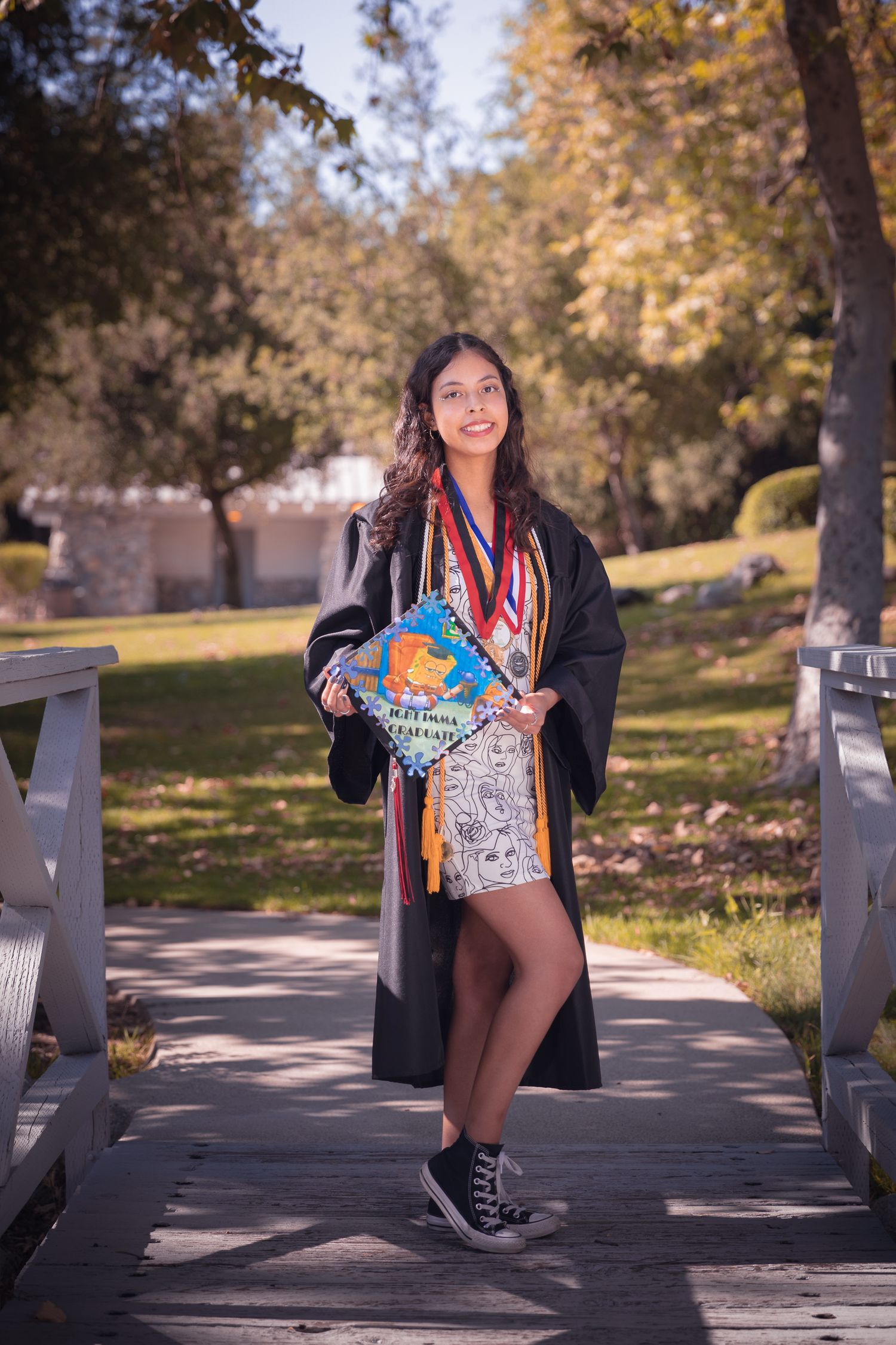 Los Angeles graduation photographer on campus Cap and gown graduation photos Los Angeles High school senior graduation photos outdoors