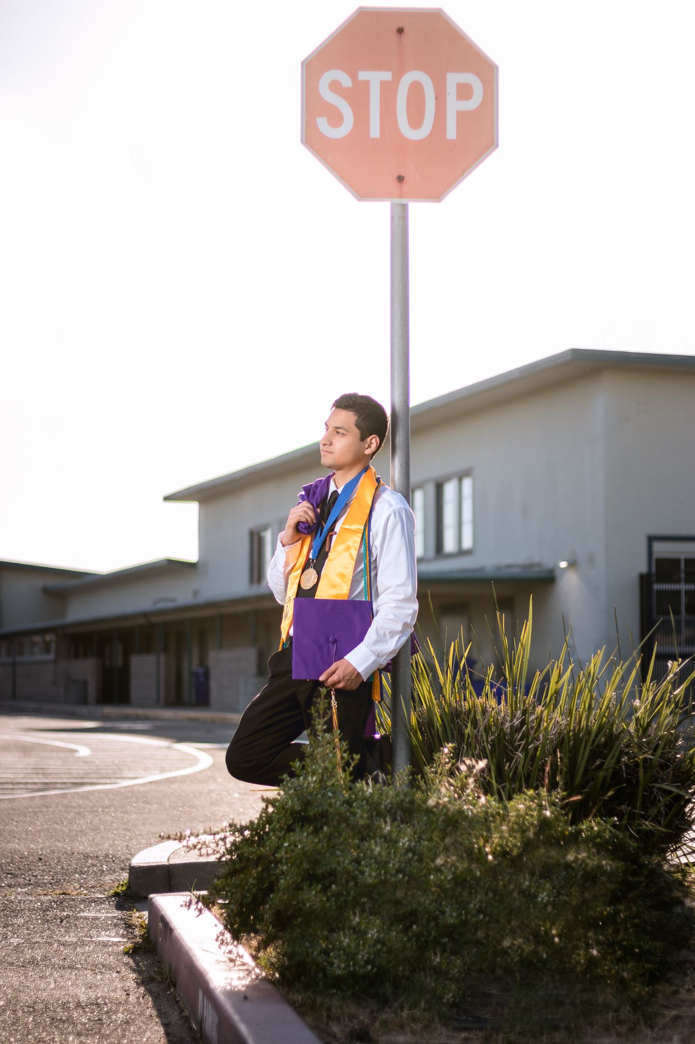 Los Angeles graduation photographer on campus Cap and gown graduation photos Los Angeles High school senior graduation photos outdoors