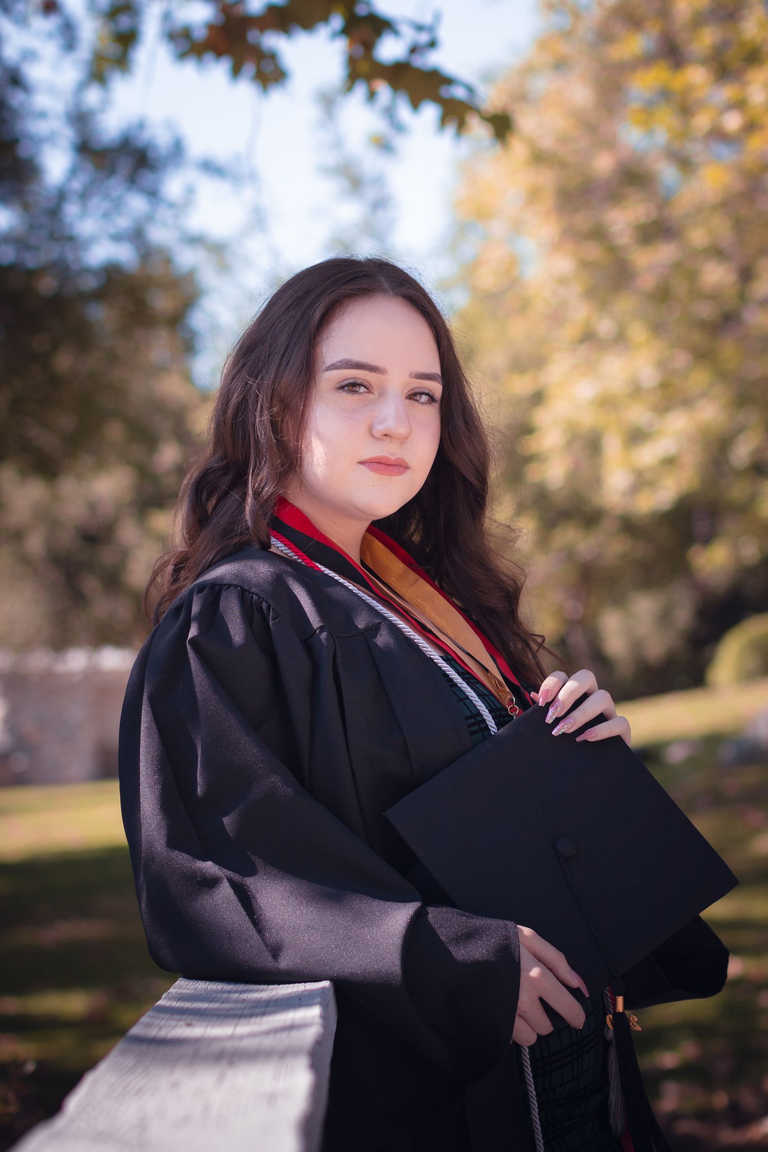 Los Angeles graduation photographer on campus Cap and gown graduation photos Los Angeles High school senior graduation photos outdoors