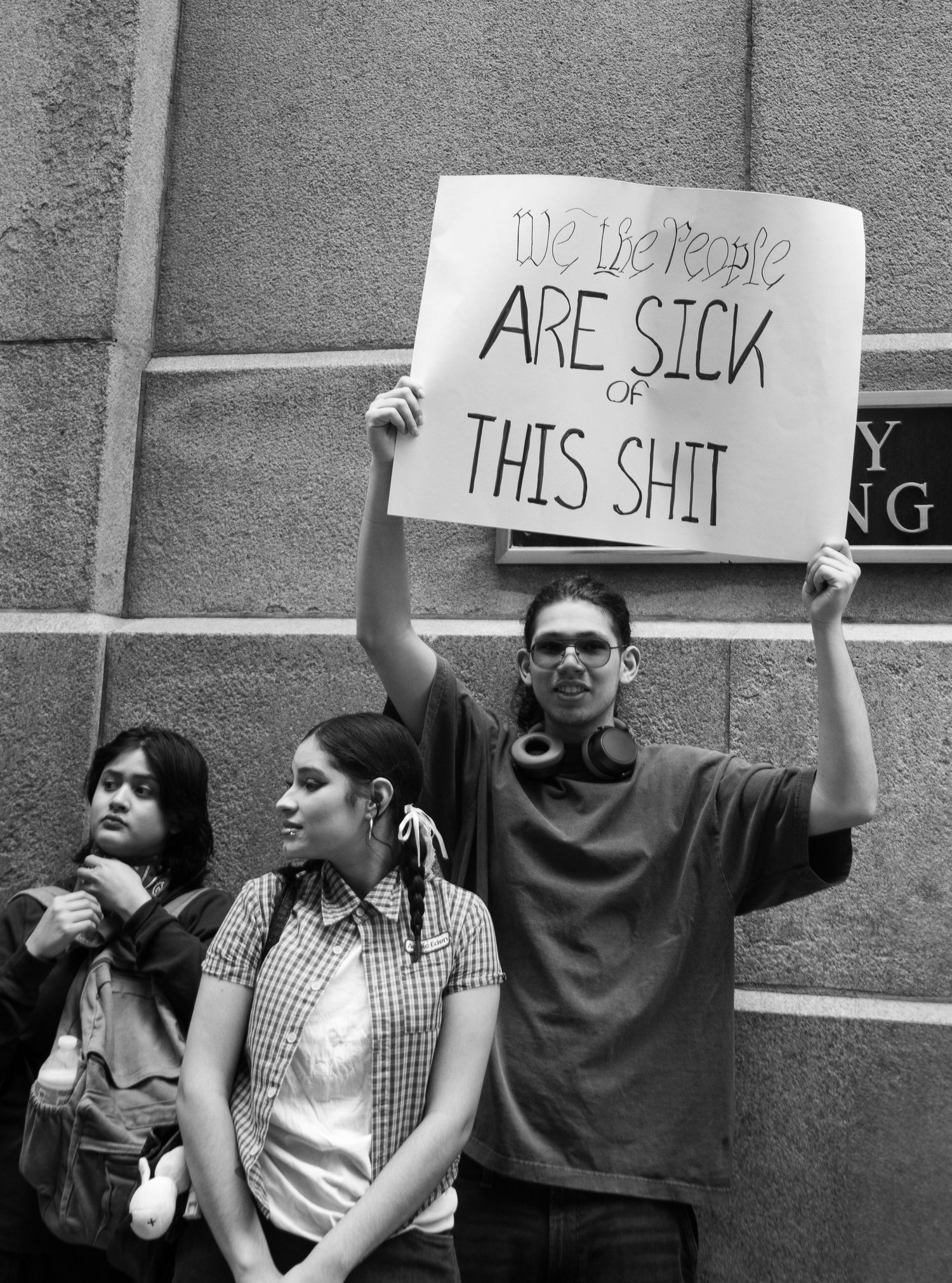 Documentary photograph of protesters gathered at a No Kings rally in Chicago, Illinois.