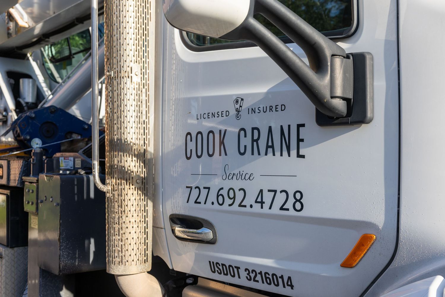 Commercial brand photograph showcasing Cook Crane Company and its equipment.
