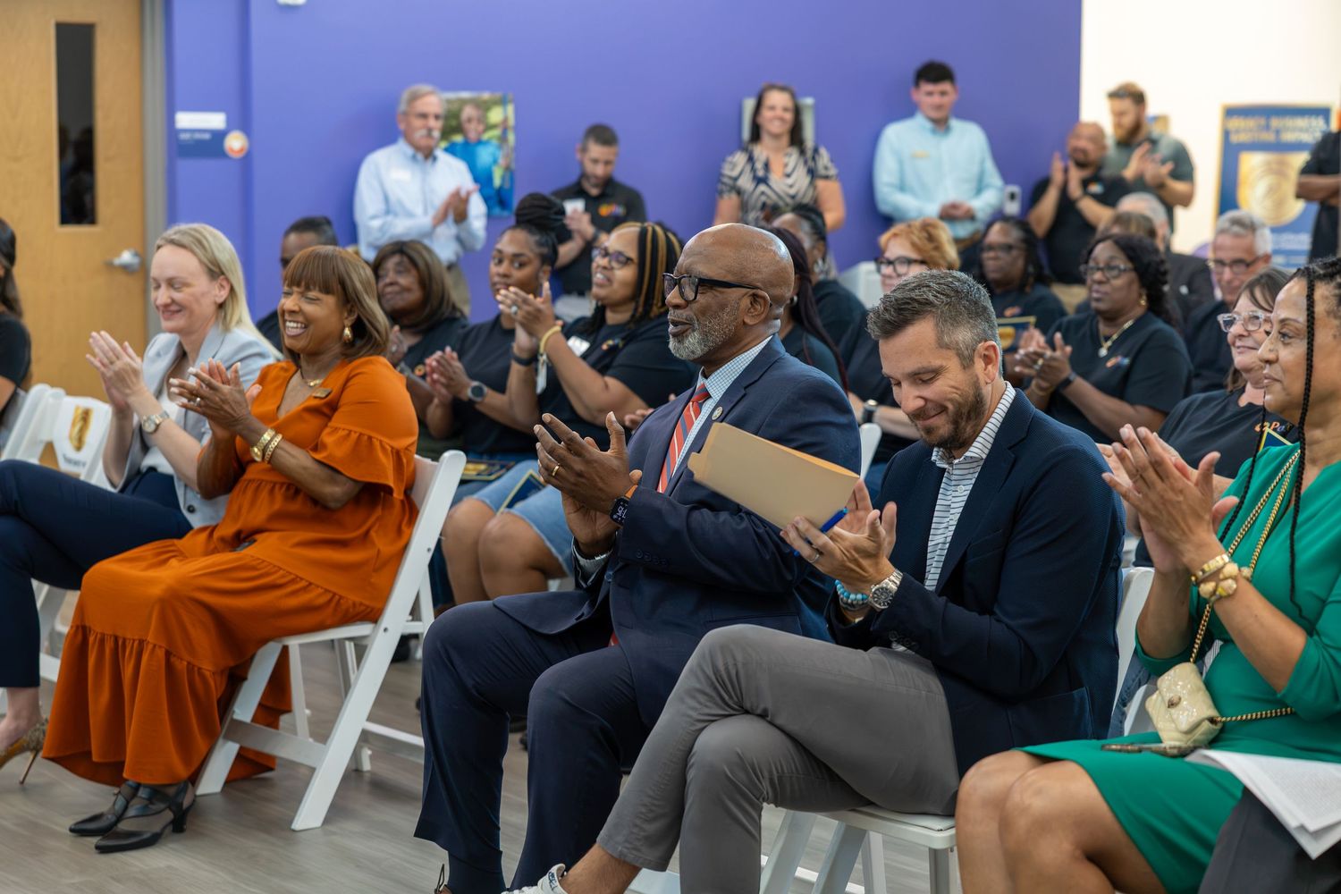 Event photograph of St. Petersburg Mayor Ken Welch applauding during The PARC ribbon-cutting ceremony in St. Petersburg, Florida.
