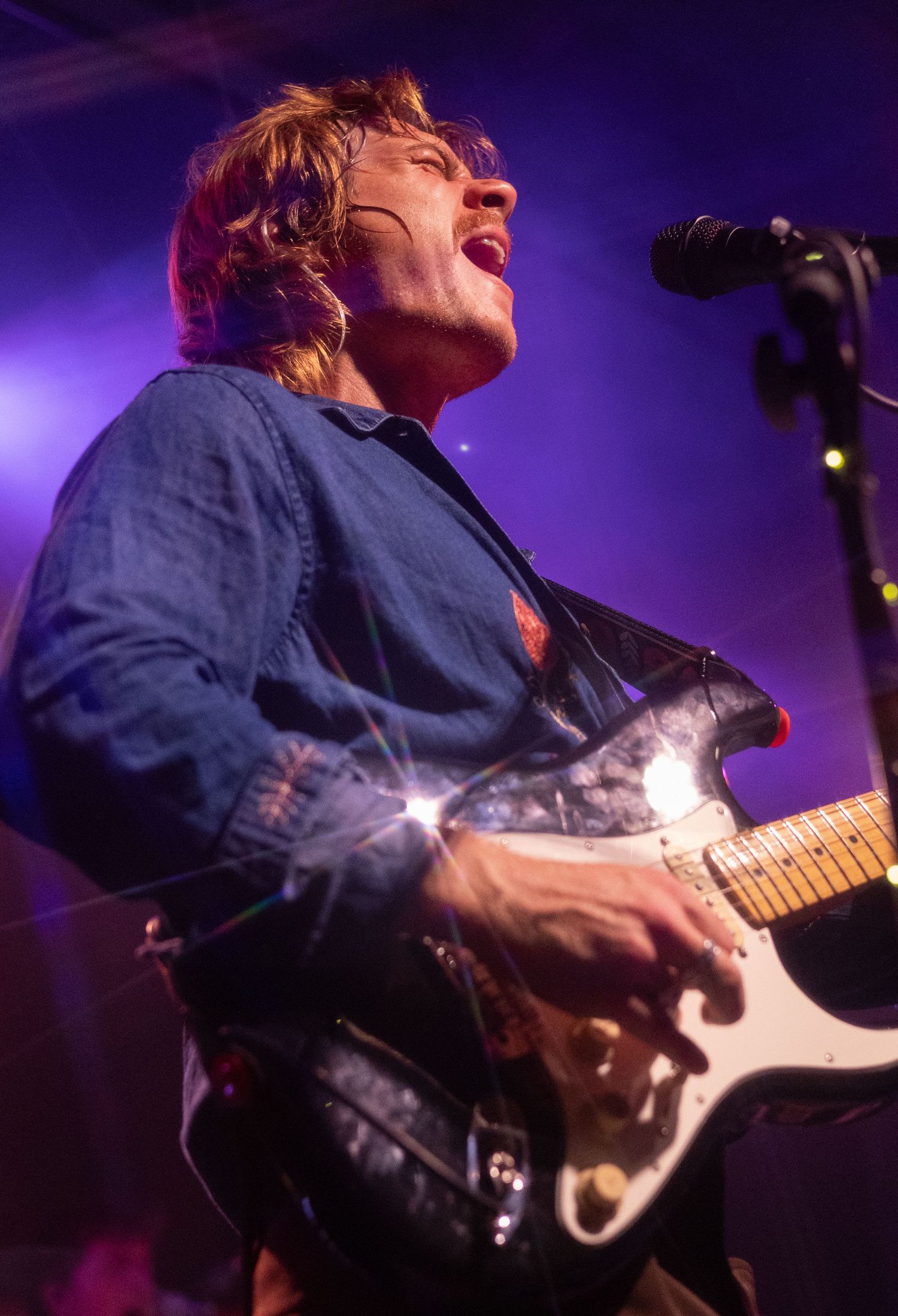 Portrait concert photograph of a Tors guitarist performing live at Schubas Tavern in Chicago, Illinois.