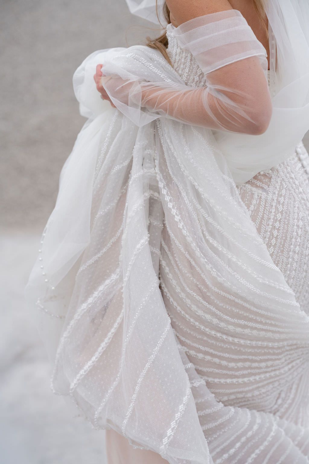 Wedding dress details photographed by Michigan Photographer Kayla Raquel Photo.