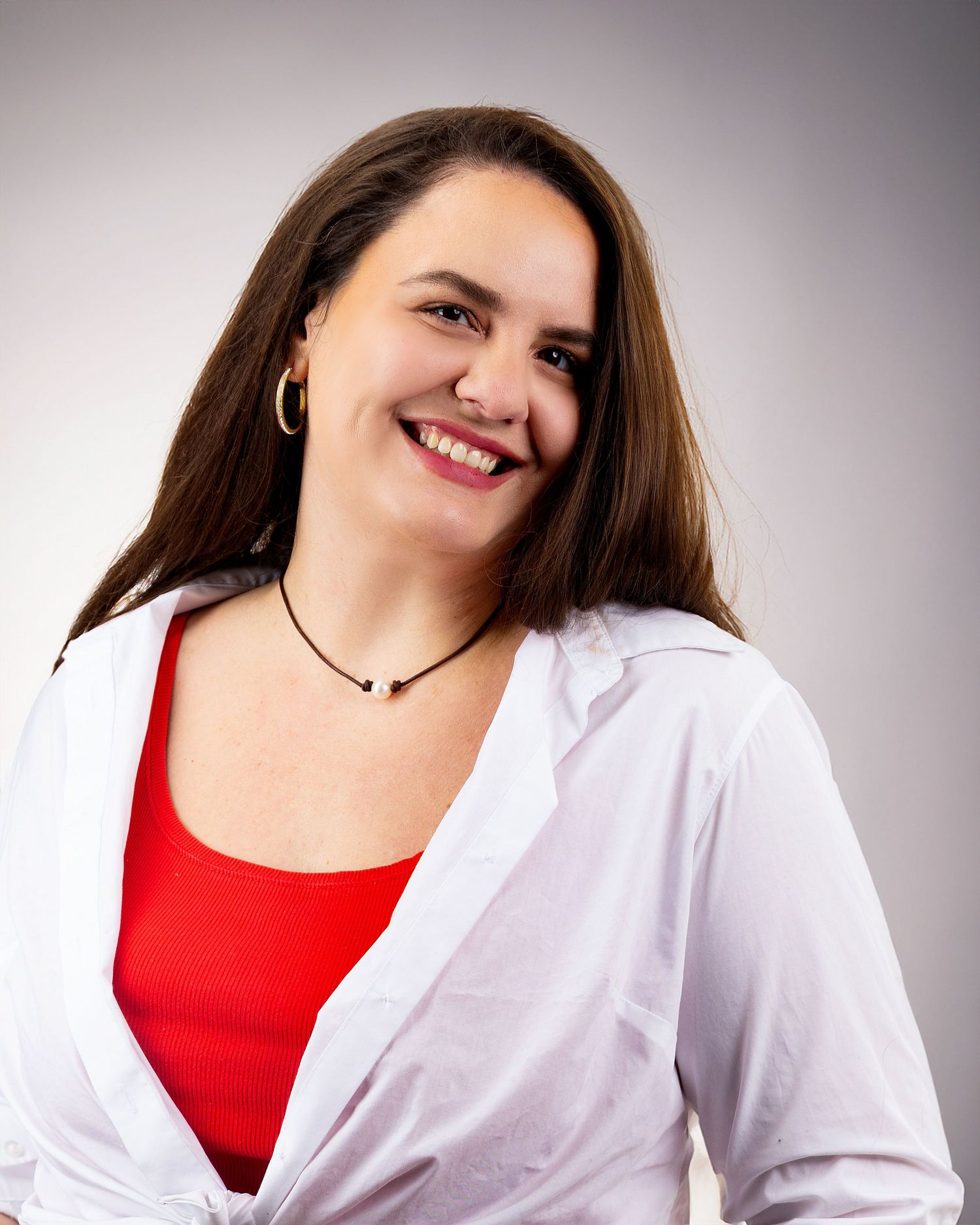 Soft image of woman smiling with red lipstick