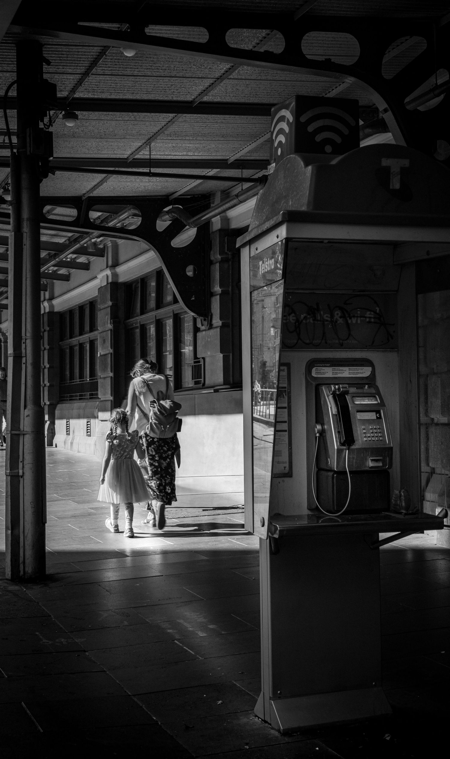 Storytelling image of woman and child in an urban Melbourne setting