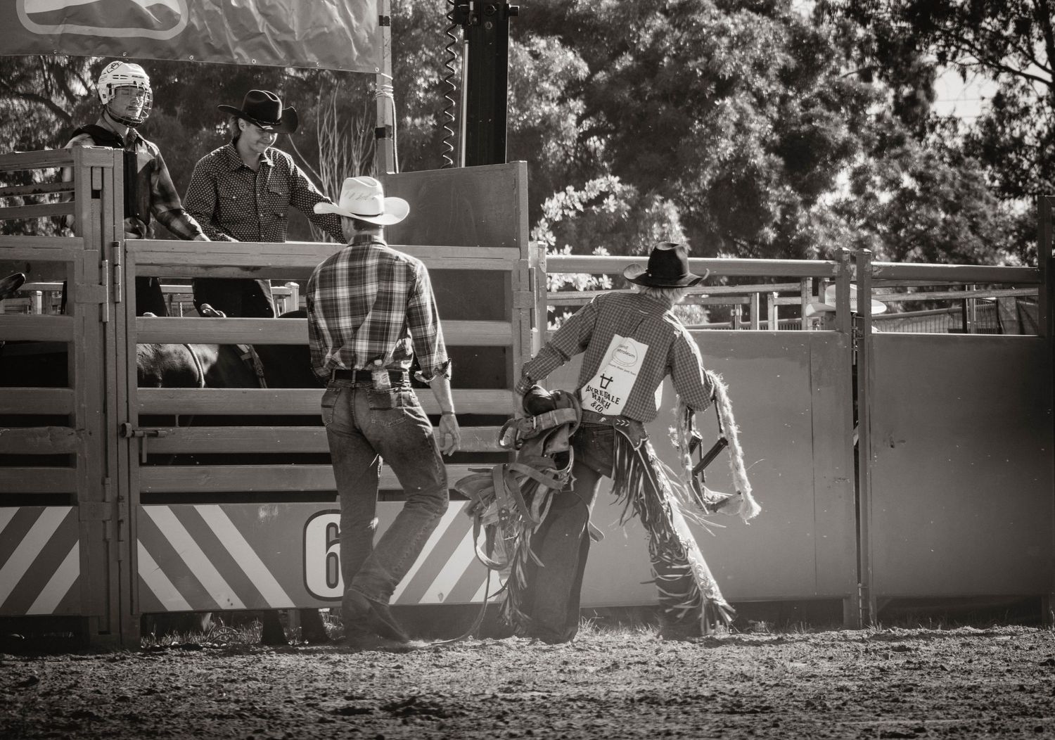 Documentary style rodeo image showing riders before the event