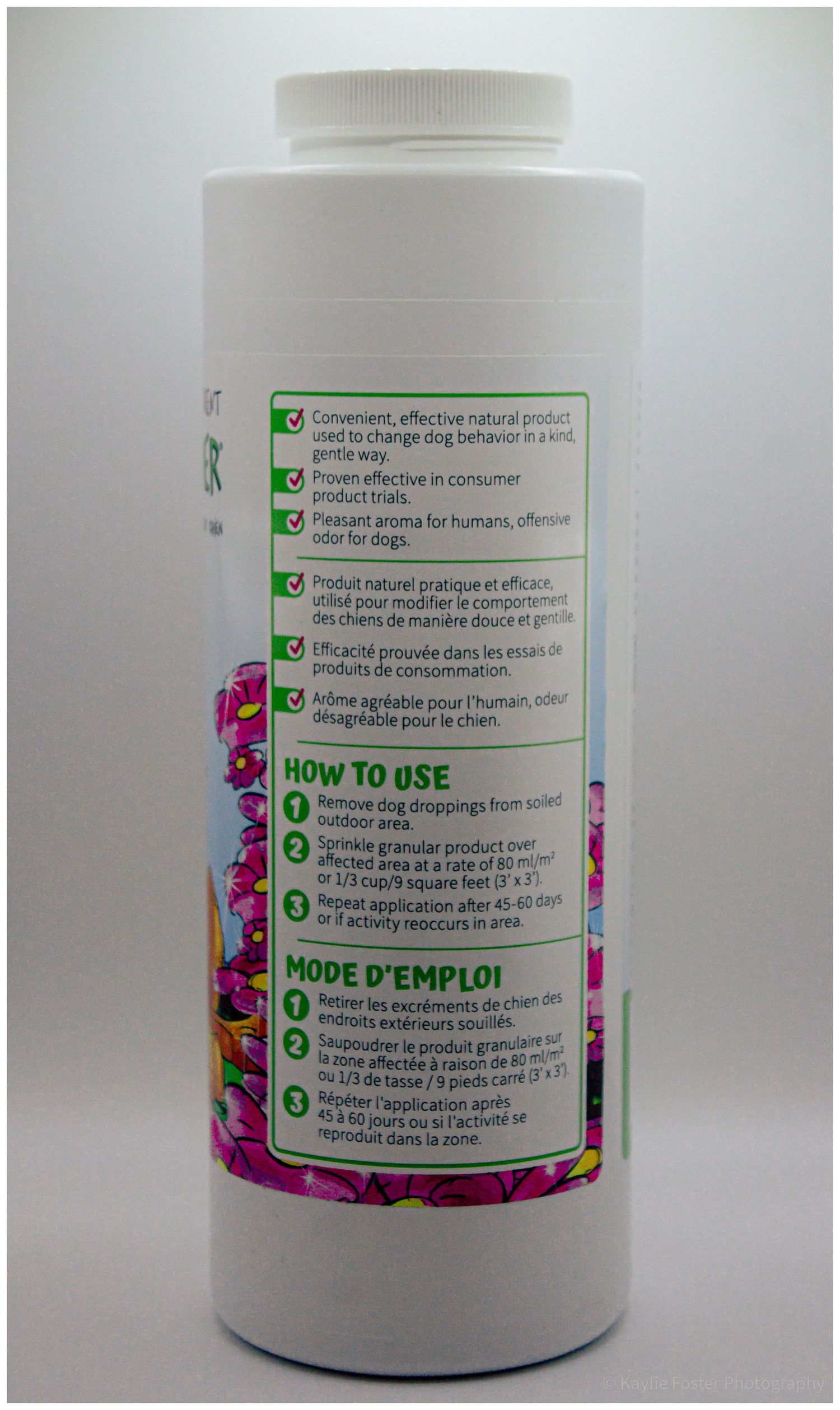 White bottle of dog behavior correction granular product with bilingual HOW TO USE instructions on the label.