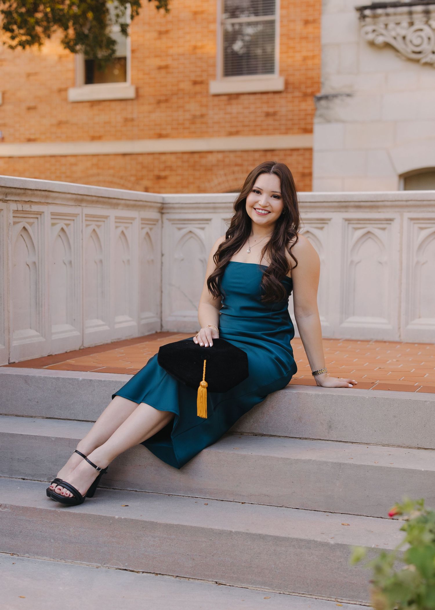 San Antonio senior photographer, graduate on UIW university steps