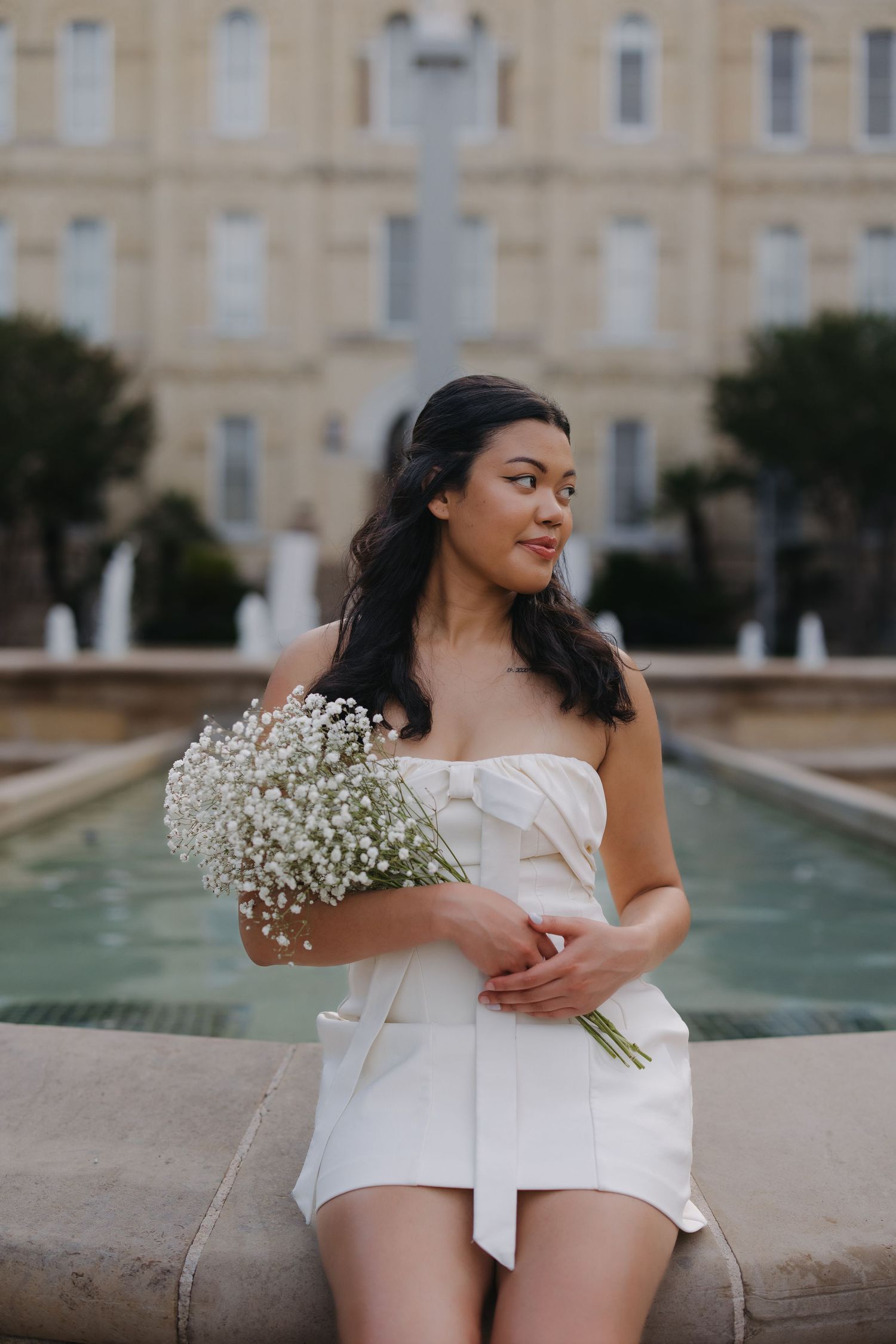Senior portrait session at St. Mary's fountain in San Antonio