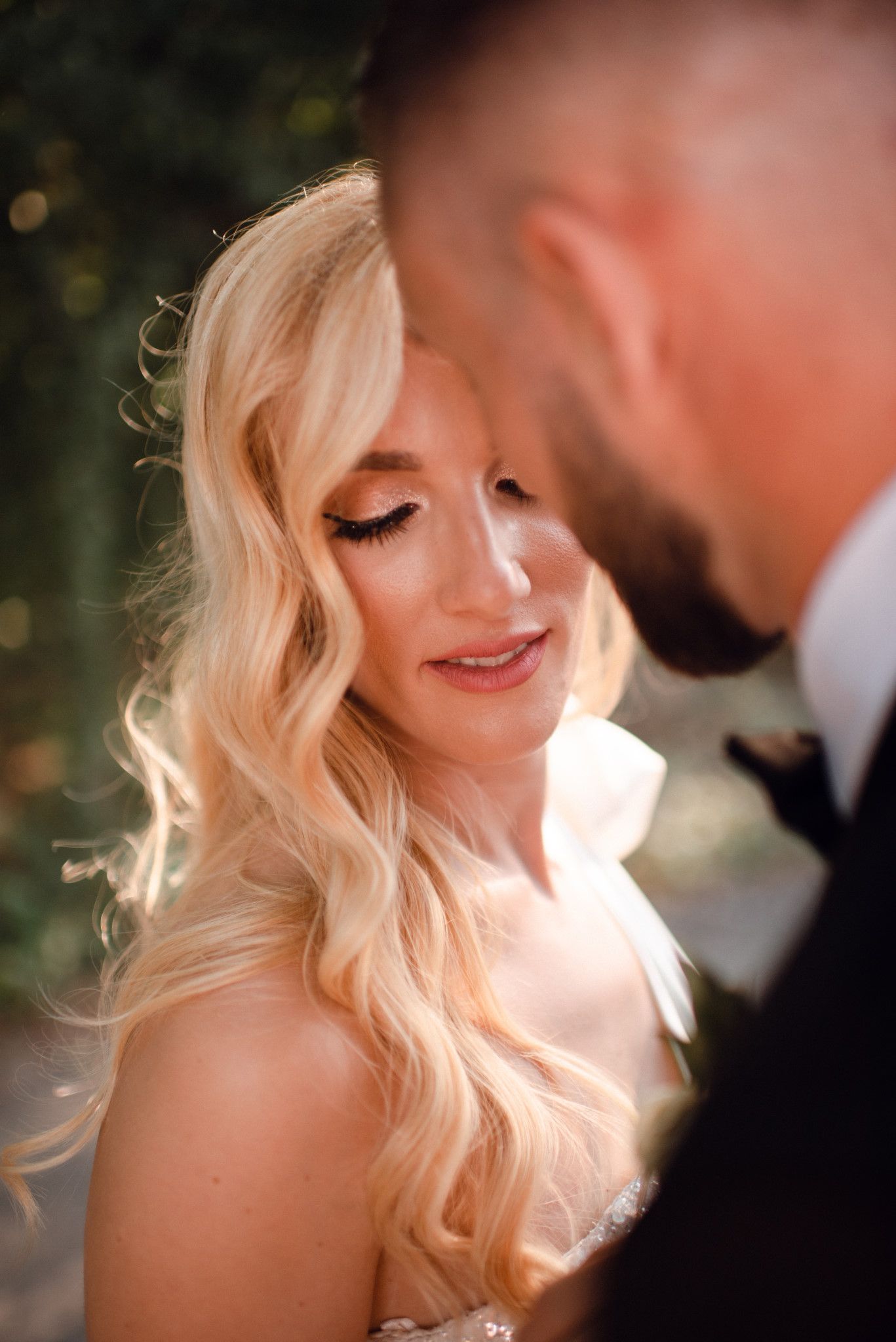 Soft sunlit portrait with romantic golden hour lighting.
