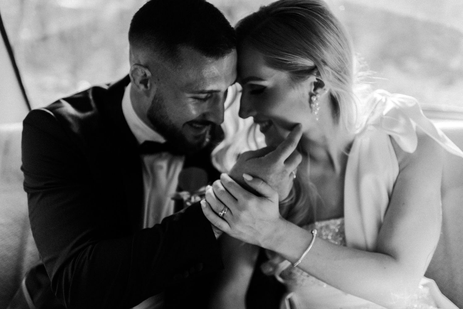 Artistic black and white wedding portraits showing emotional moments. Cinematic