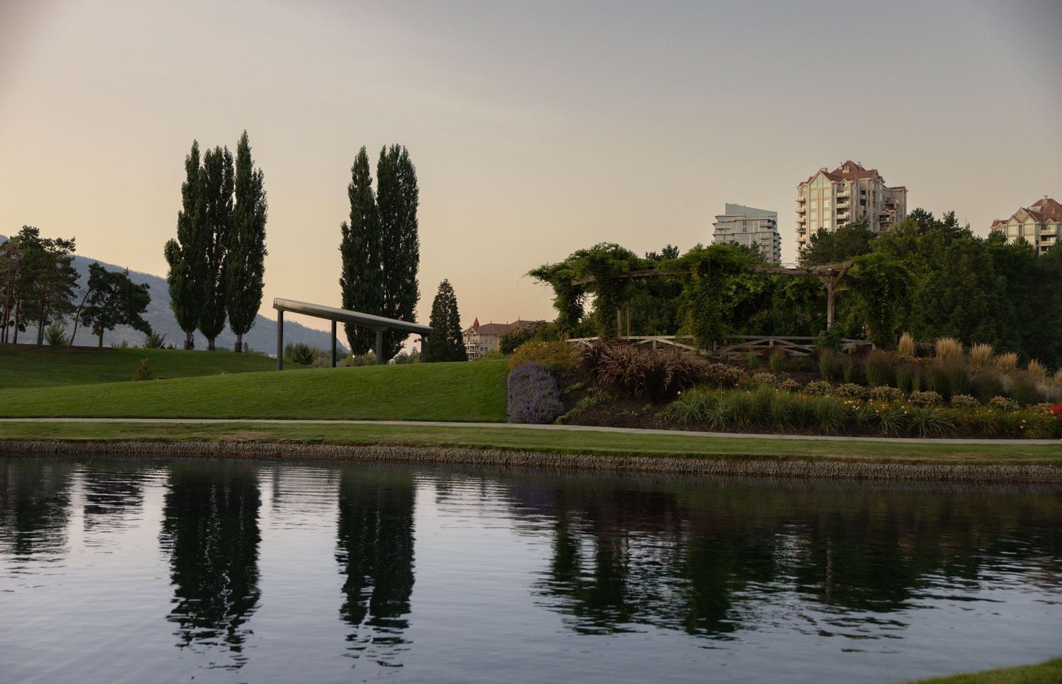 Waterfront proposal location in Kelowna, British Columbia, overlooking scenic gardens and lakeside views.