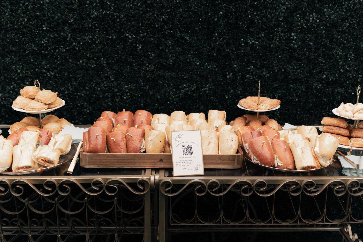 Rows of fresh raw chicken breasts displayed in a butcher shop or meat counter.