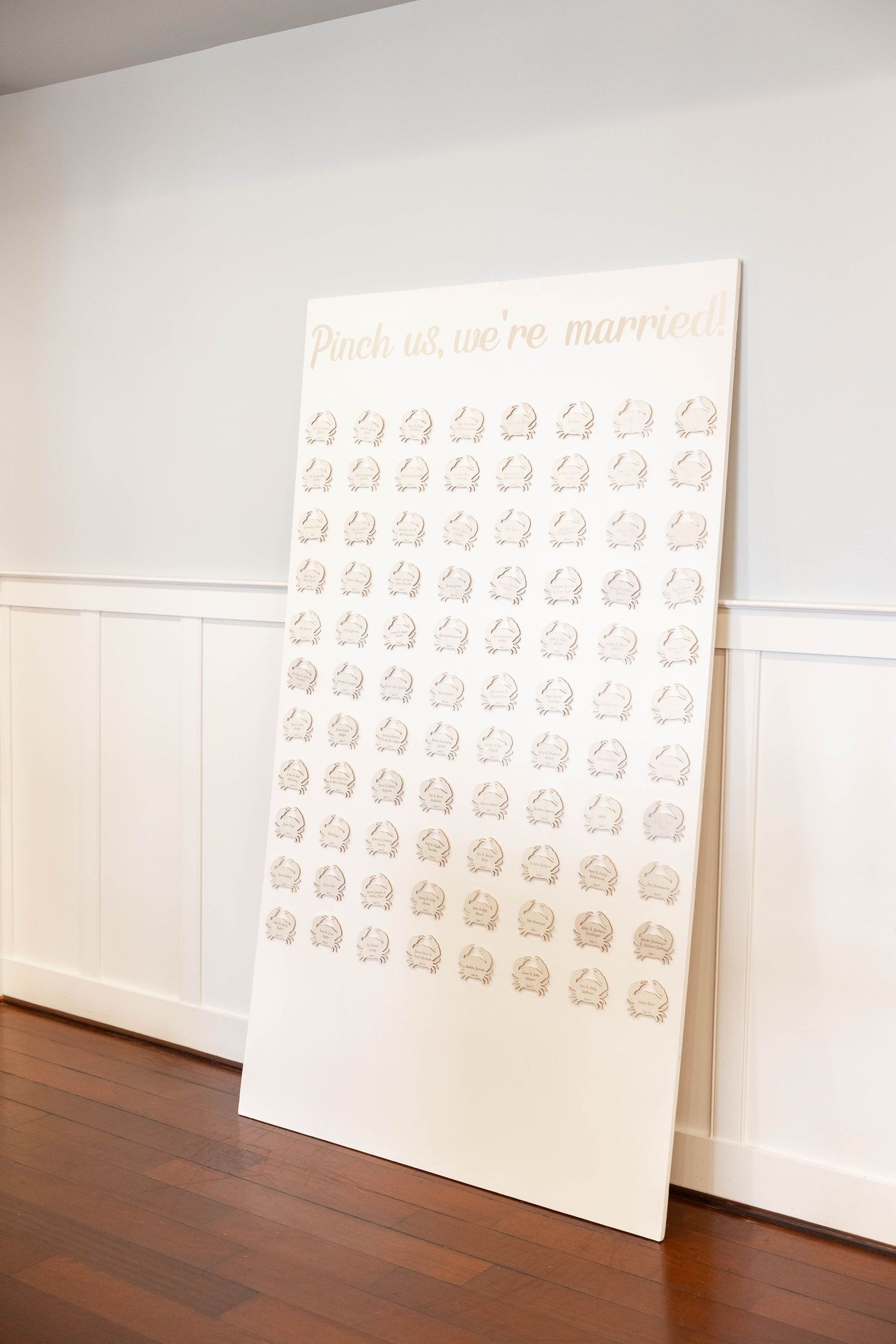 Modern art installation with repeated pattern prints on white gallery walls.