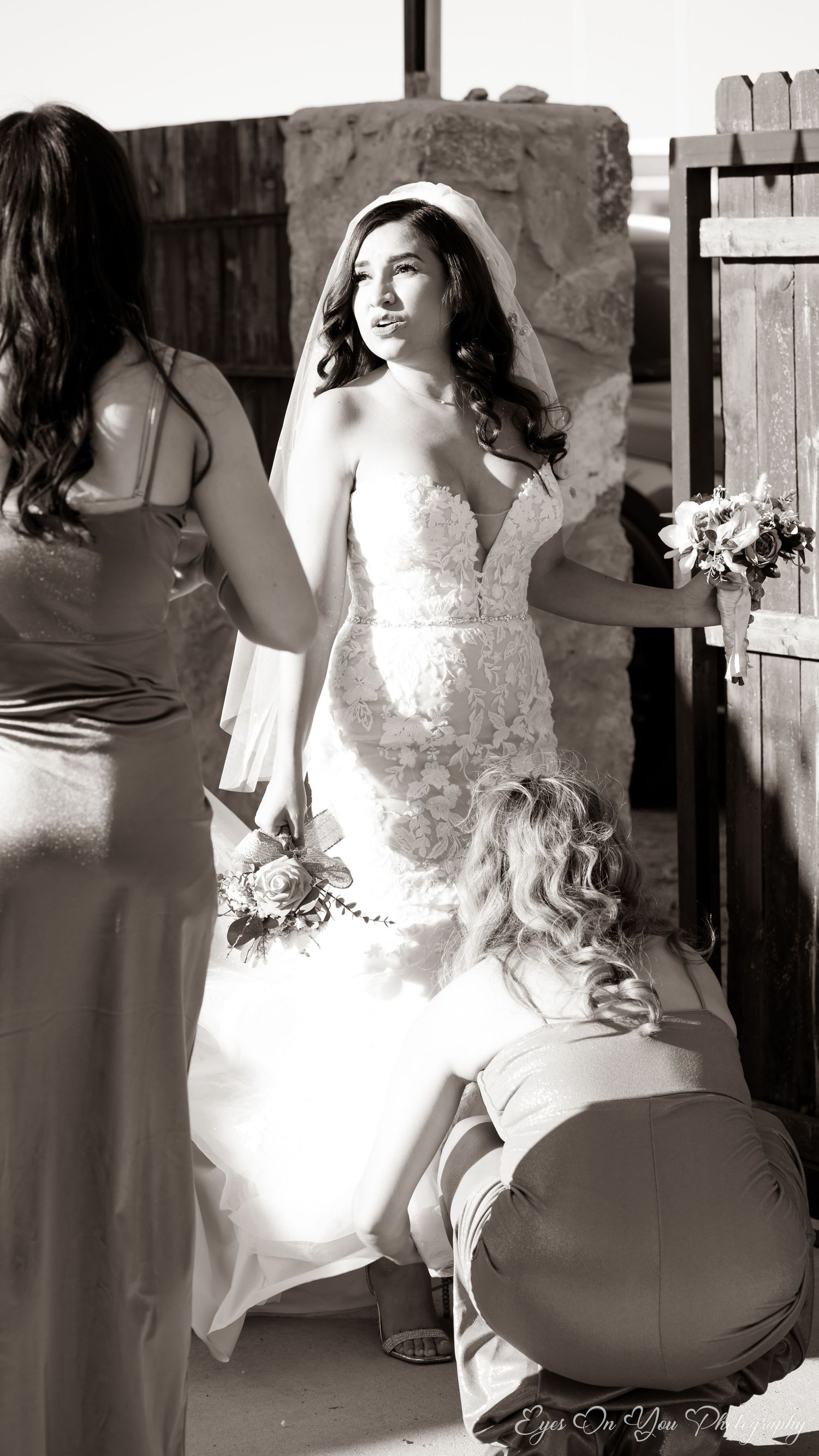 Elegant bridal portrait session in black and white showing details of lace wedding dress.
