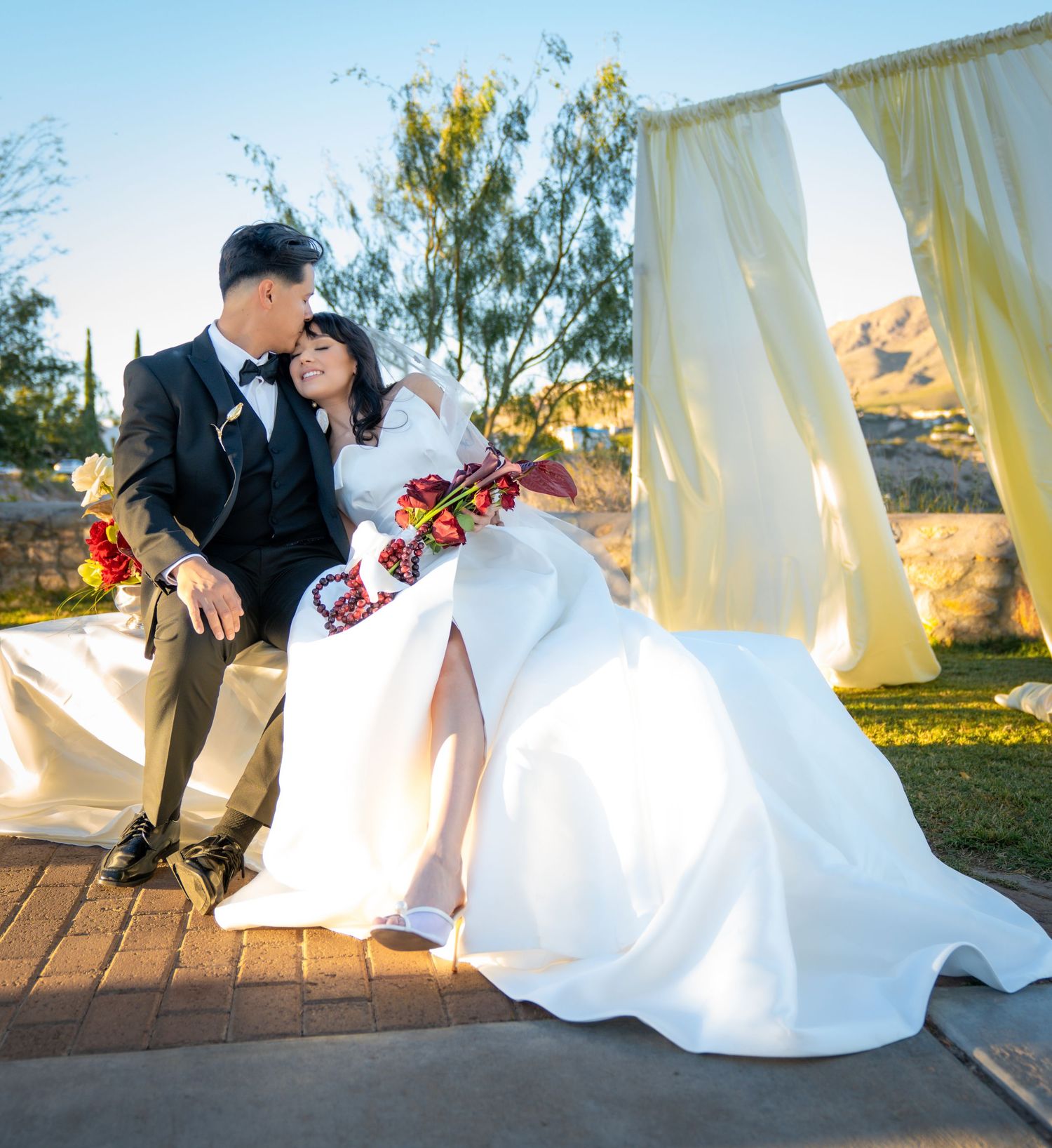 A sequence of romantic dips during an outdoor wedding photoshoot at sunset on a paved walkway.